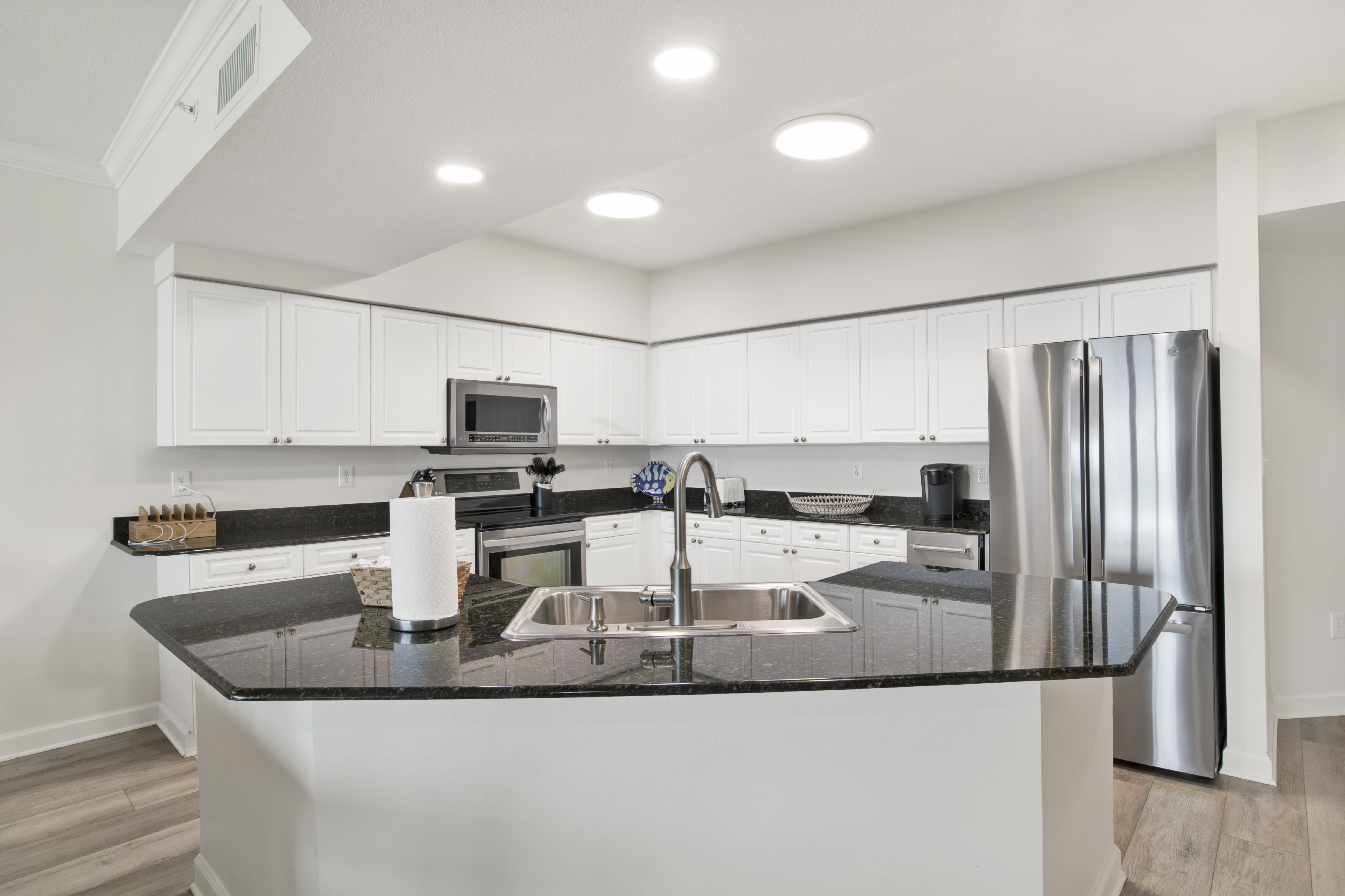 Large fully stocked kitchen and a separate pantry for groceries.