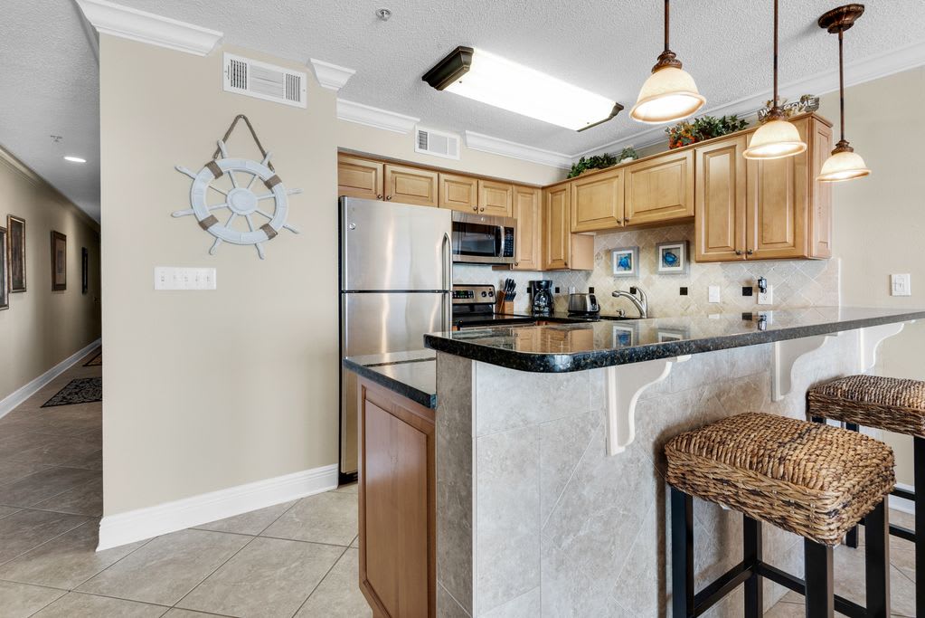 Kitchen has two bar stools!