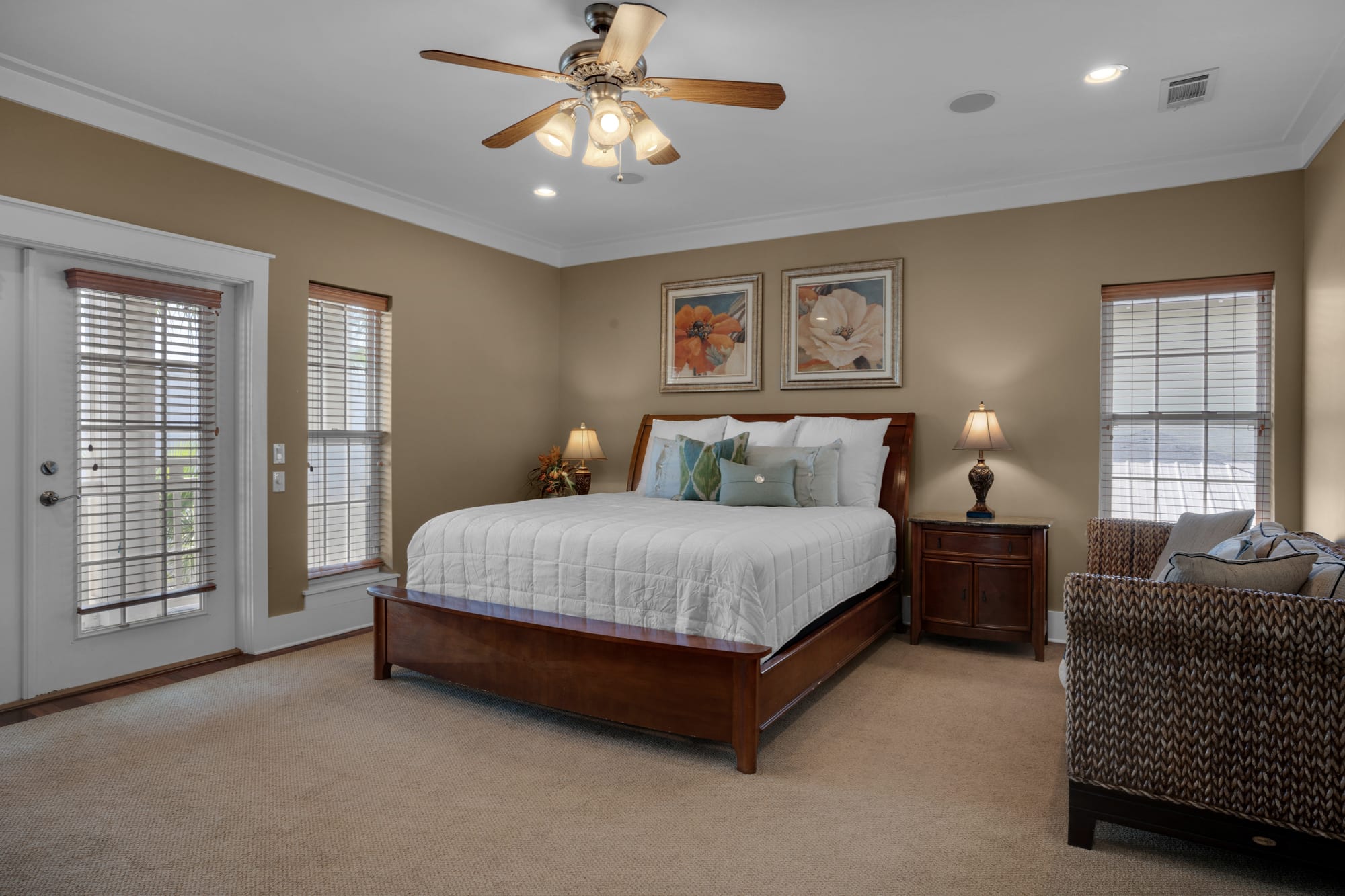 The huge master bedroom has a king bed, private balcony, &amp; en-suite bathroom!