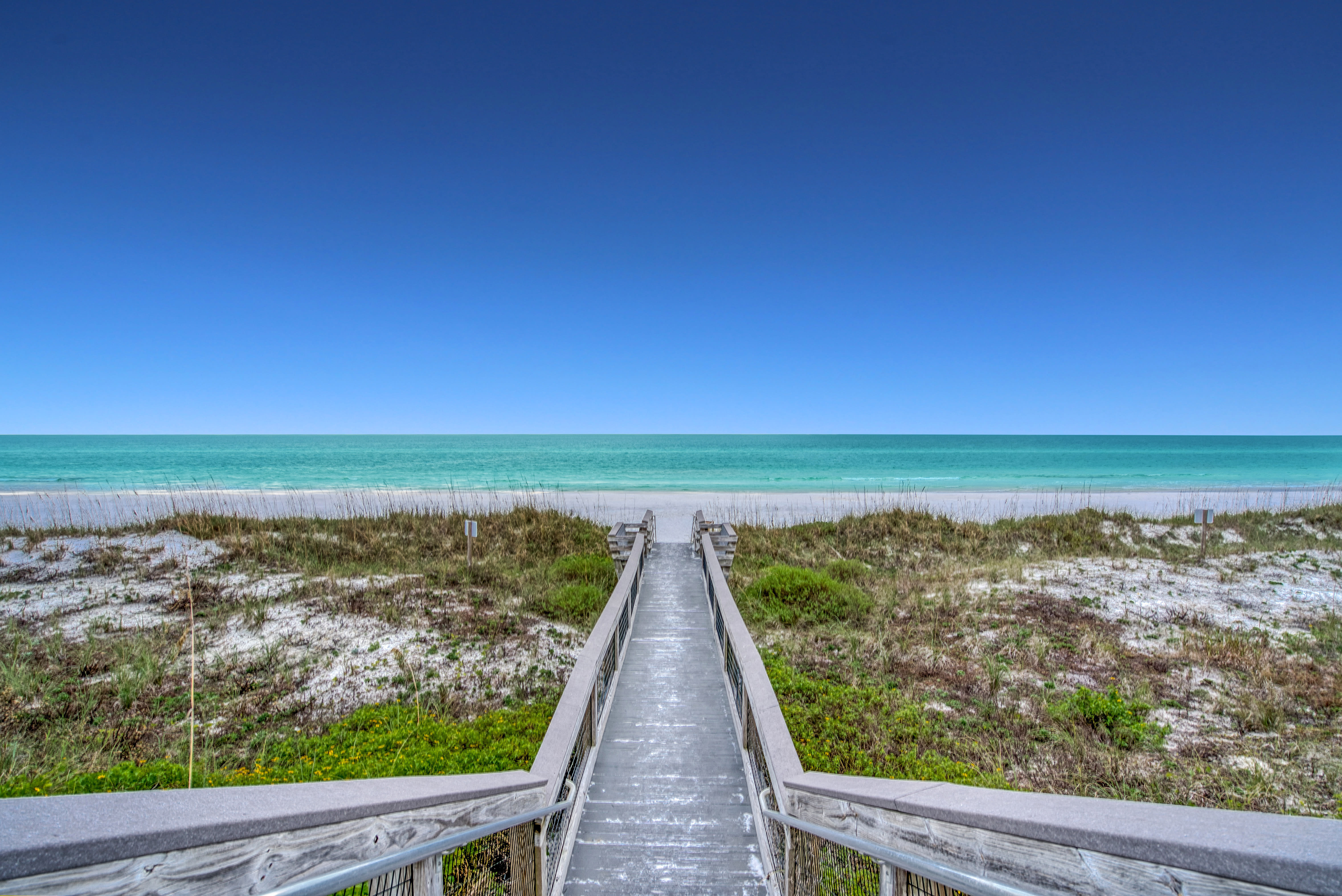 Private Beach Walkway - Steps from your Patio!
