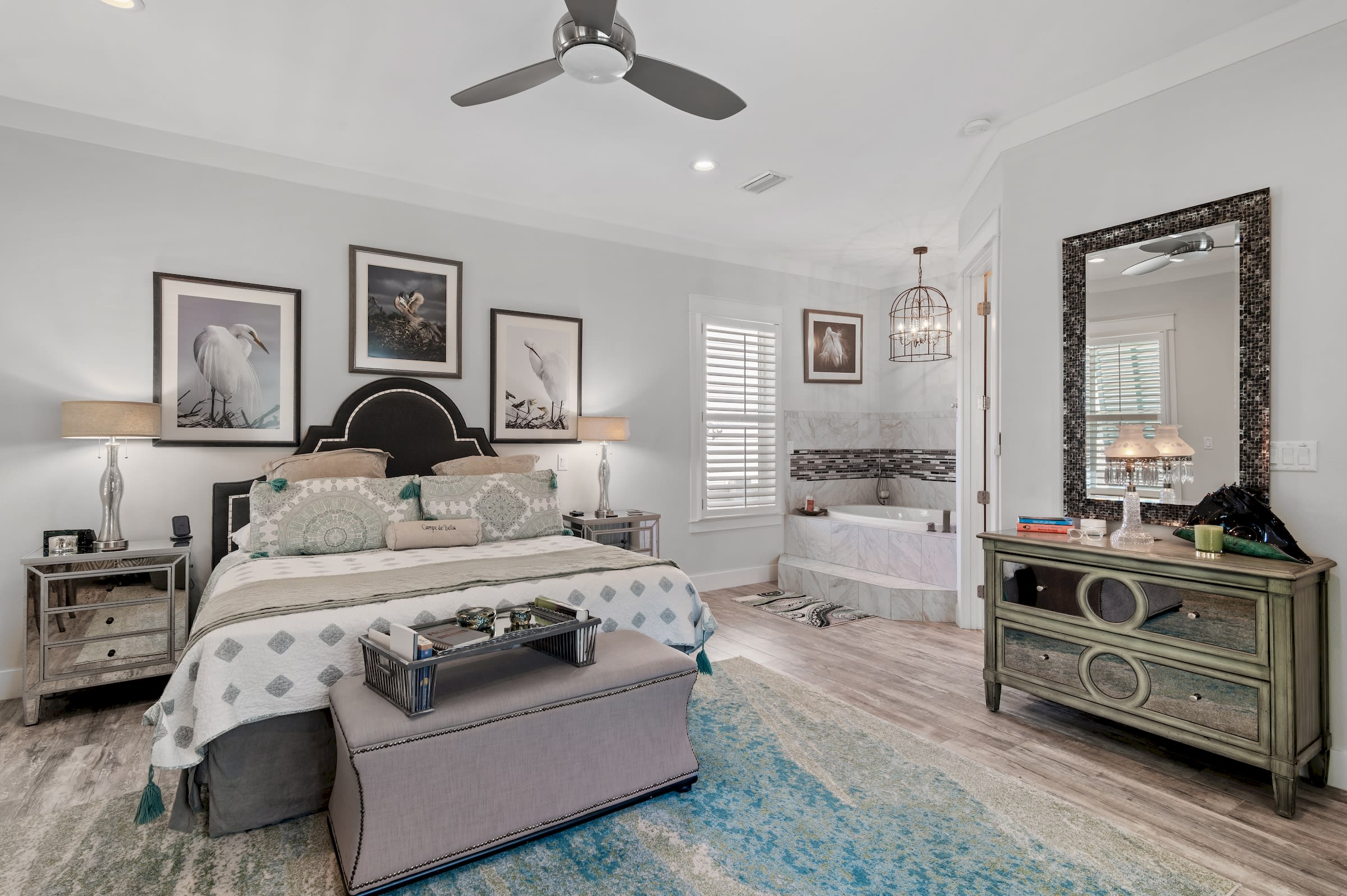 Master Bedroom on first floor overlooks the pool, garden tub spa