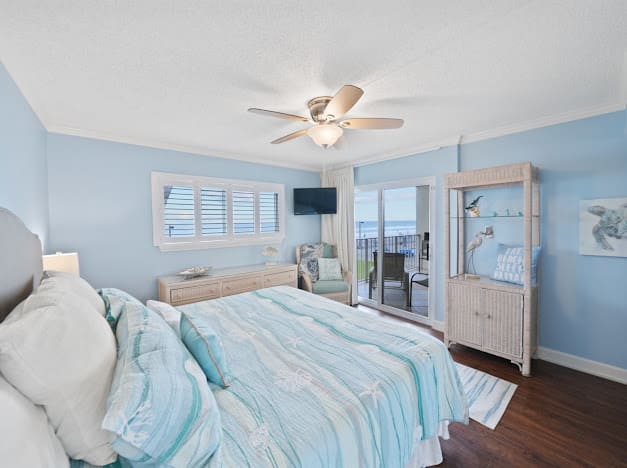 Relaxing master BR with closet, en suite bath &amp; balcony access.