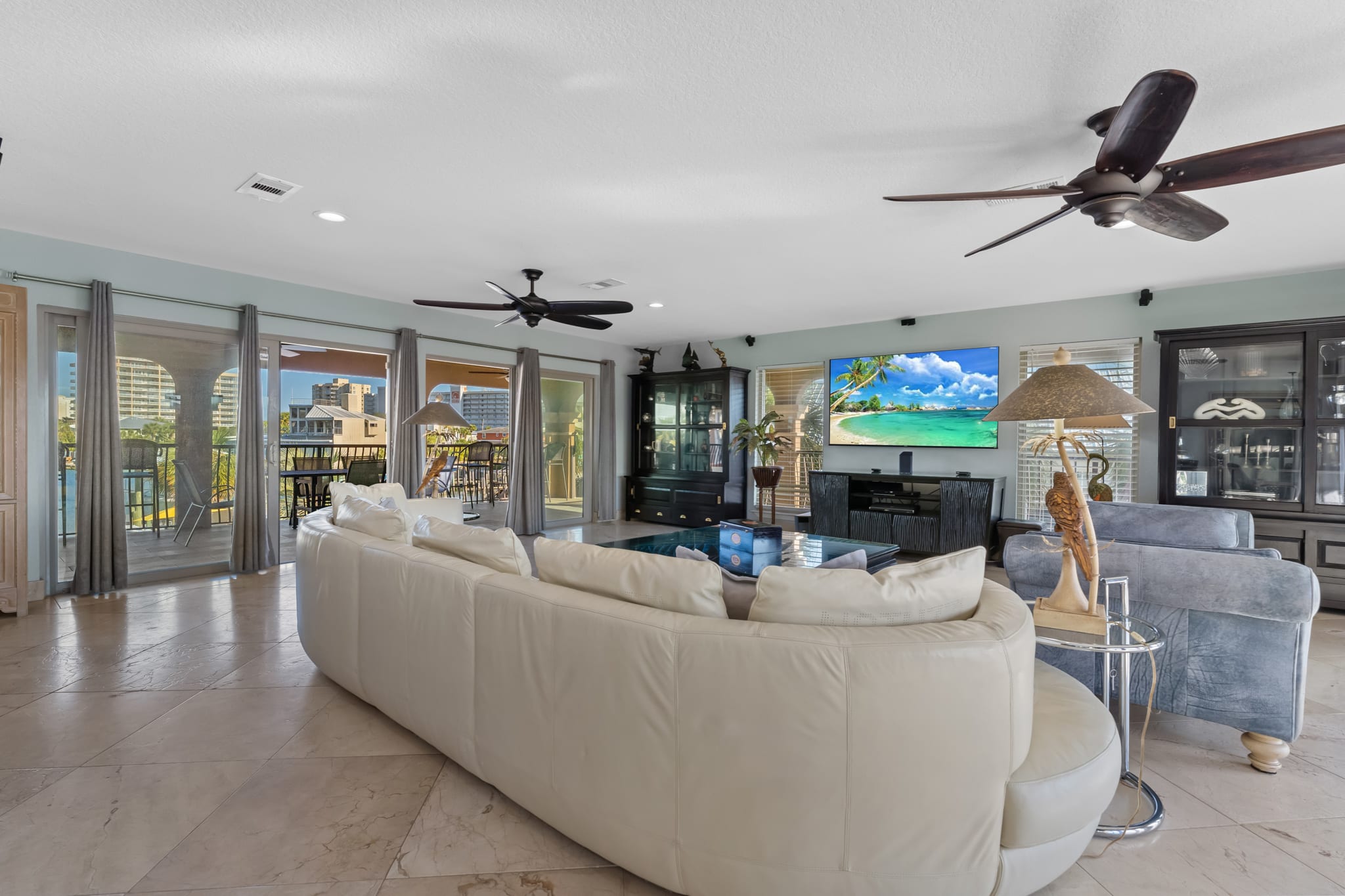 Beautiful living room, floor to ceiling glass on all sides. Views everywhere!!  