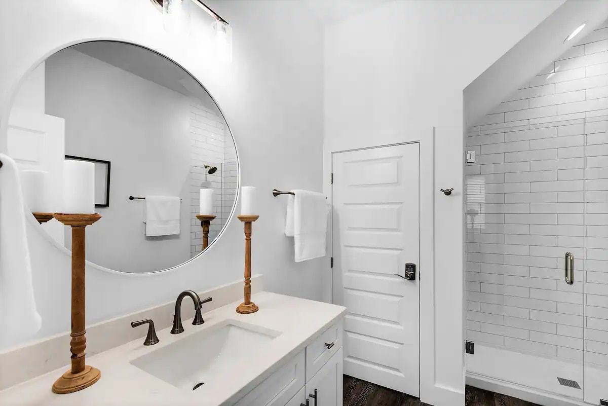 Bliss-18 1st Floor. Bedroom 1. Private Bath Picture 1. Private bath with frameless glass walk-in shower.