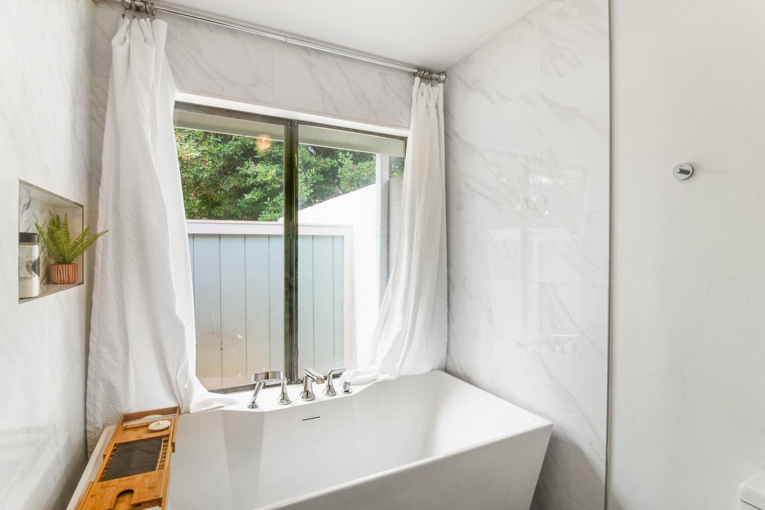 Custom Bathroom with free standing tub and epsom salt for soaking. 