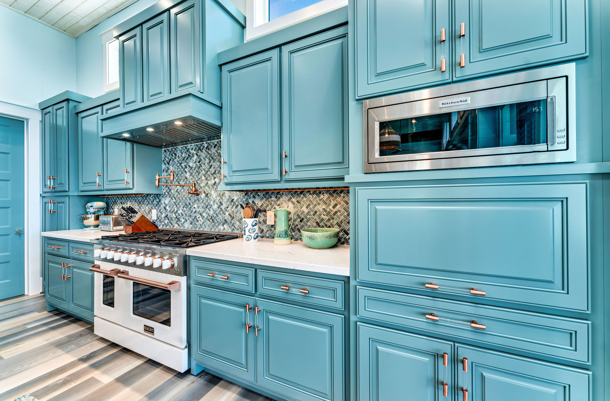 Handmade custom wood cabinetry. Professional appliances throughout the home