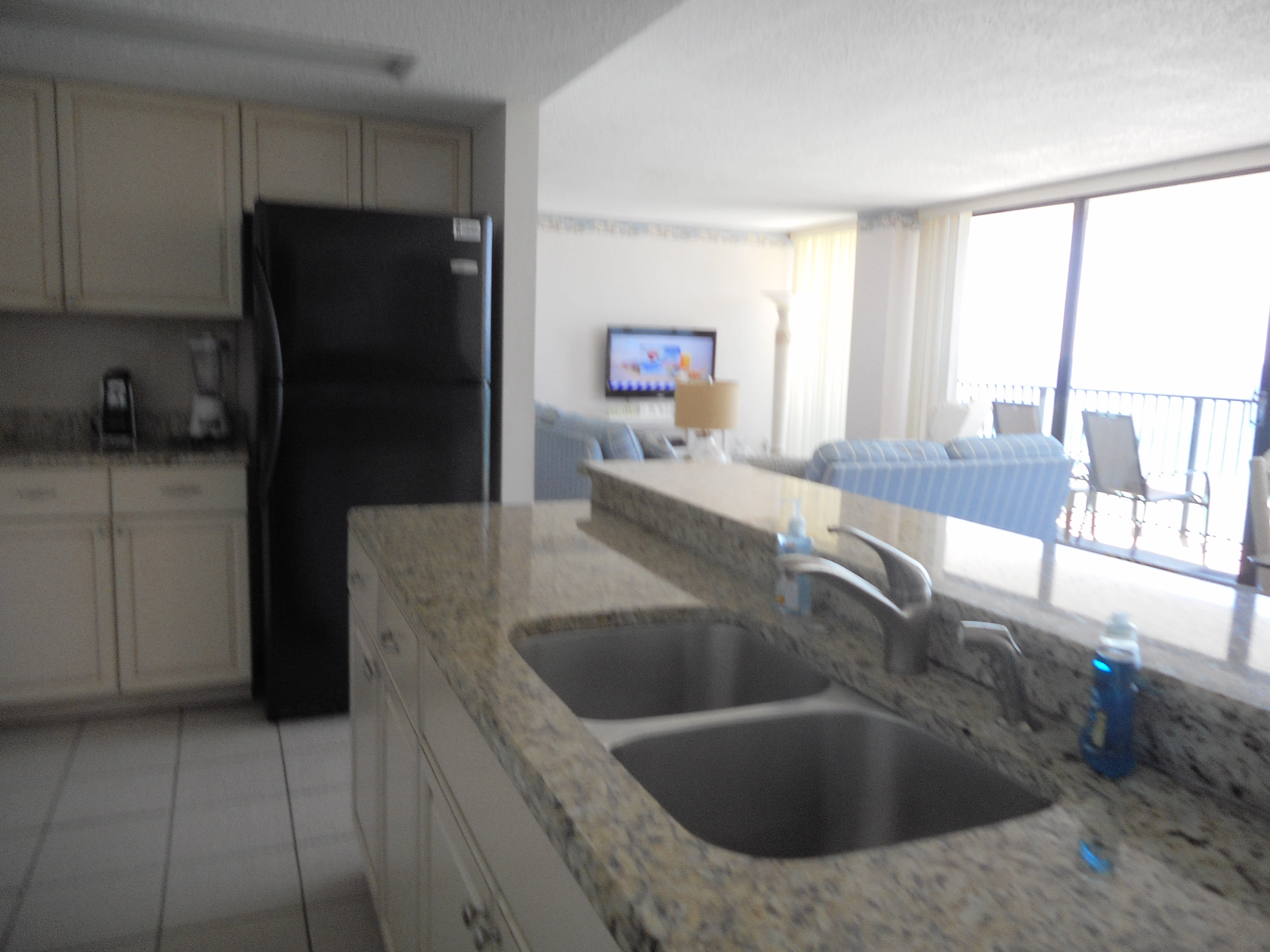 GRANITE COUNTERTOPS. WELL STOCKED KITCHEN 