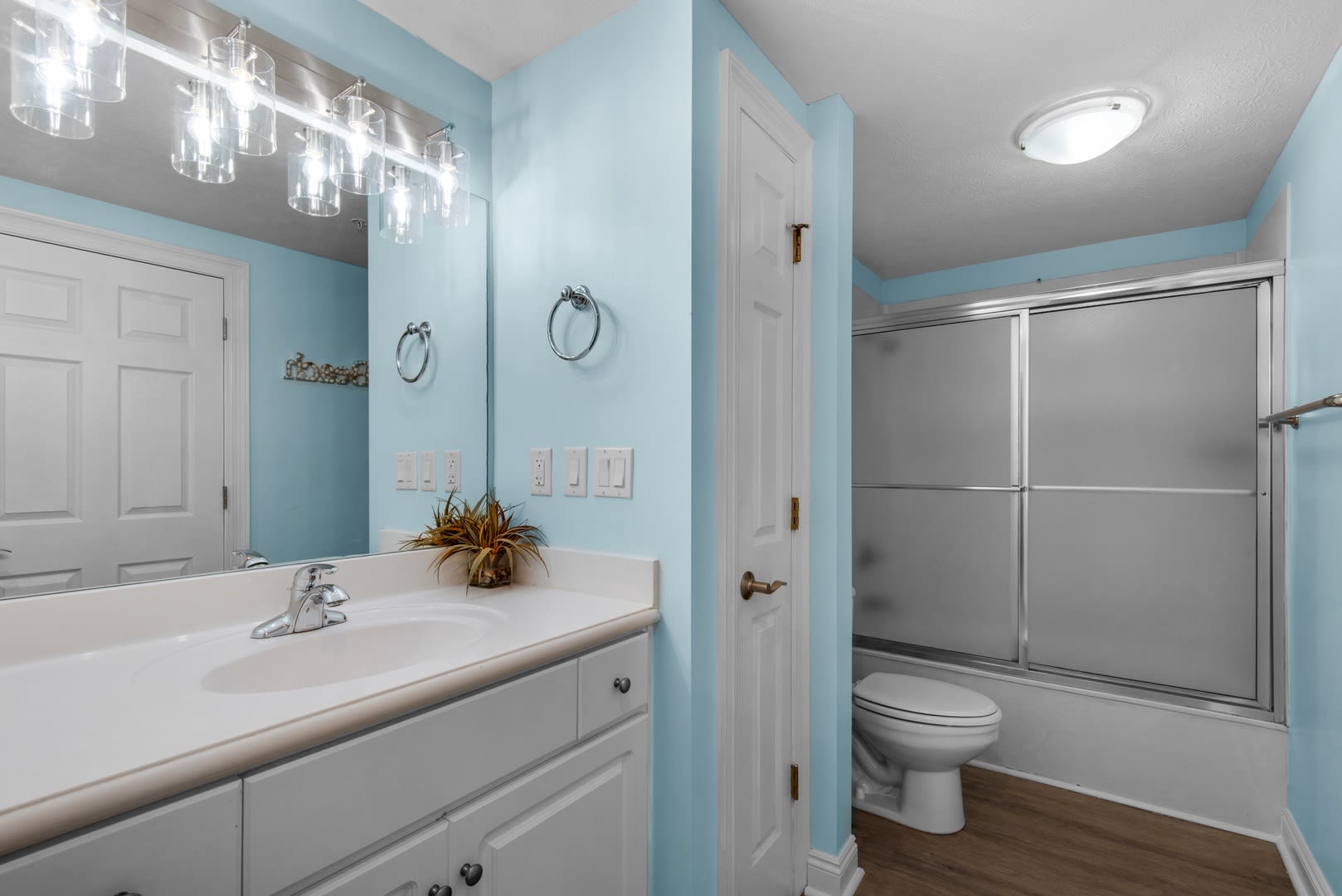 Master bathroom has a bathtub with available shower