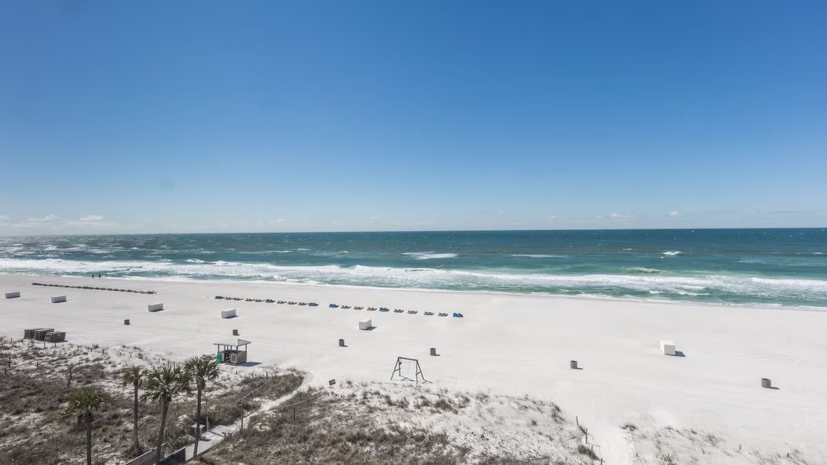 Perfect white sandy beach just outside your door.