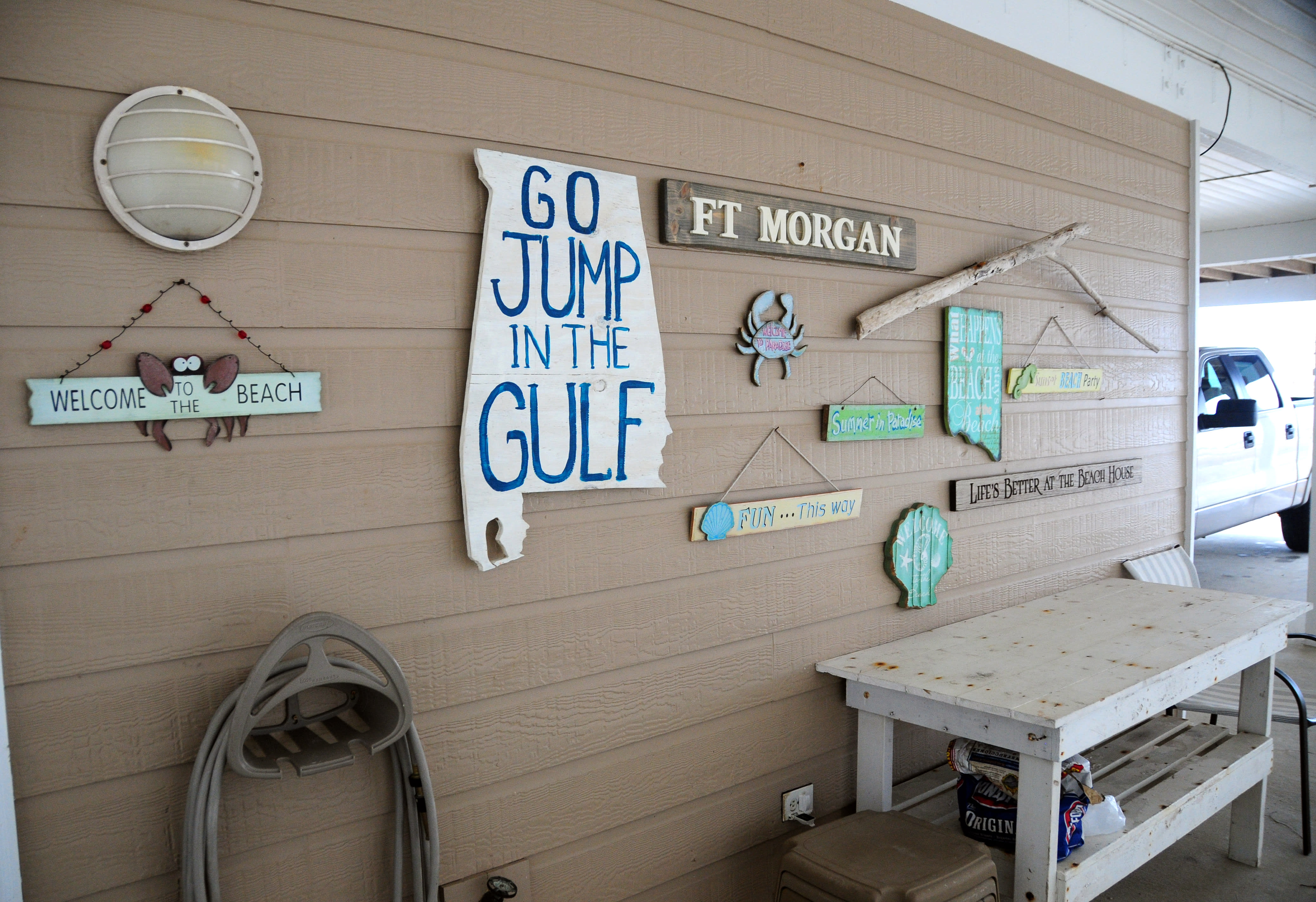 Inside the grill nook of the carport near the downstairs door