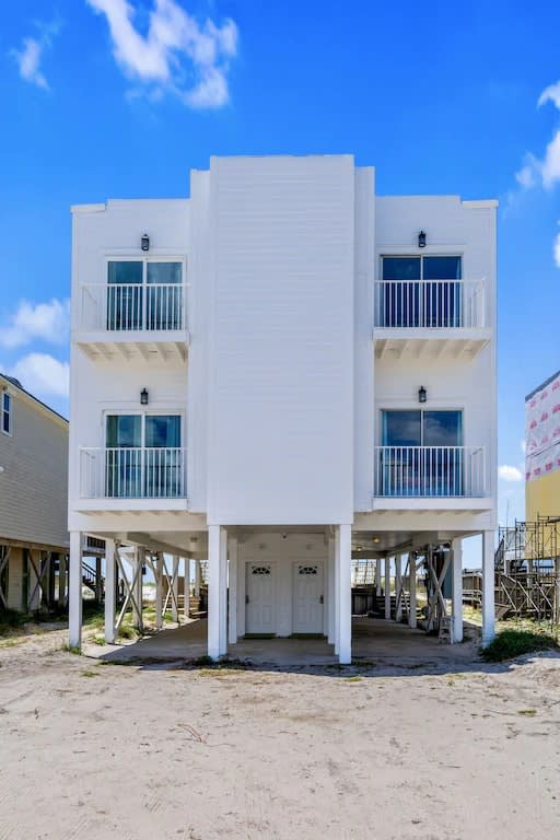Street view. Private bedroom balconies! Cover and undercover parking!!