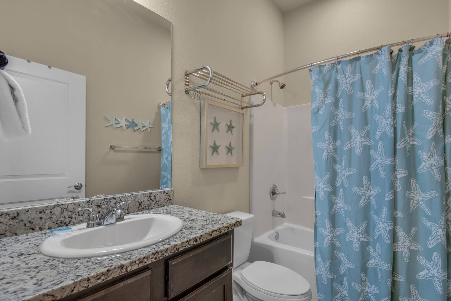 Full bathroom #2: Tub shower and spacious countertops