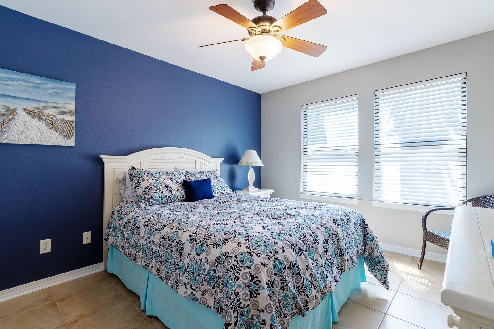 Queen bed with flat screen tv and plenty of closet space