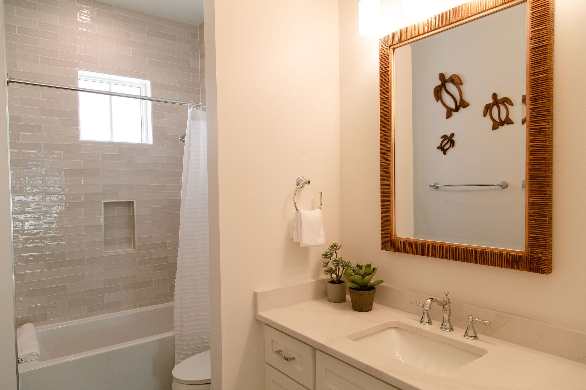 2nd floor guest bath with shower/tub combo for the living area &amp; bunk room.