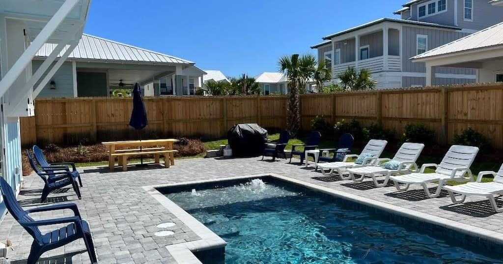 Enjoy the pool, lounge in the sun, or grill up that perfect "Cheeseburger in Paradise" on the large pavered patio at "Sunseeker"! We also include a 60" flat screen for watching the game or listening to music while outdoors!