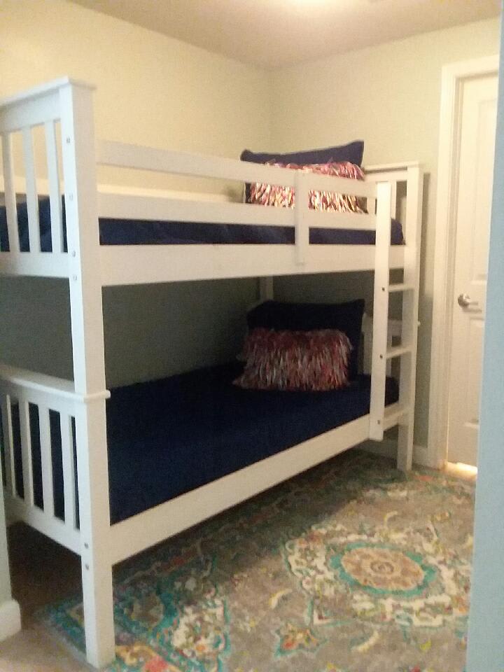 Bunk room with twin beds and own bathroom.