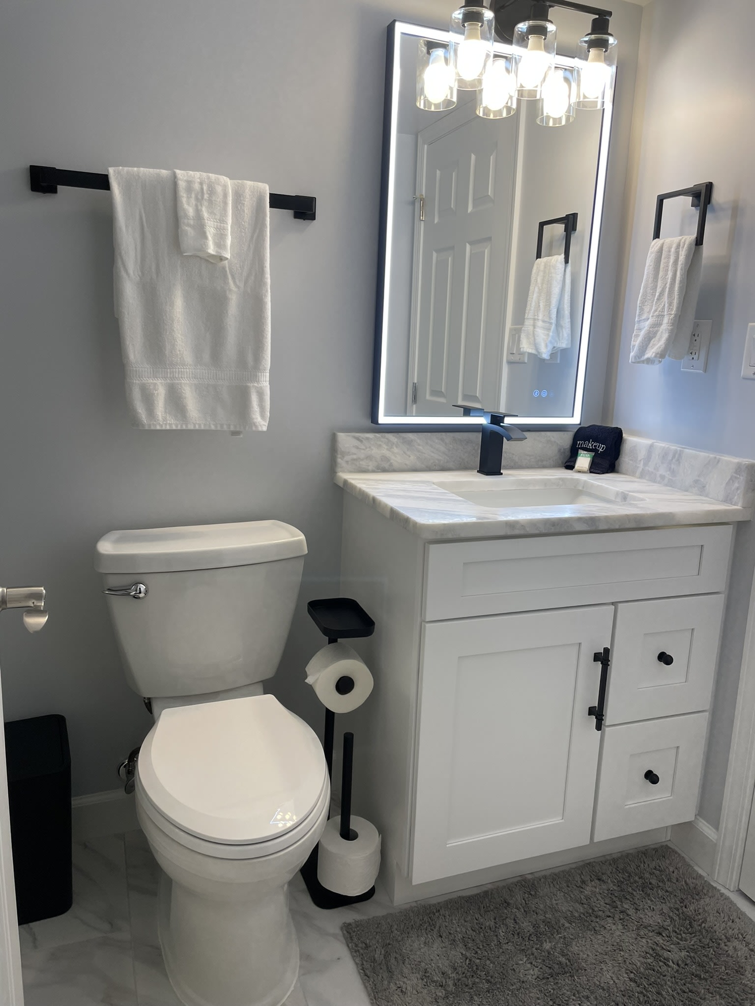 The second full bath is accessible from the front bedroom and the hallway.  