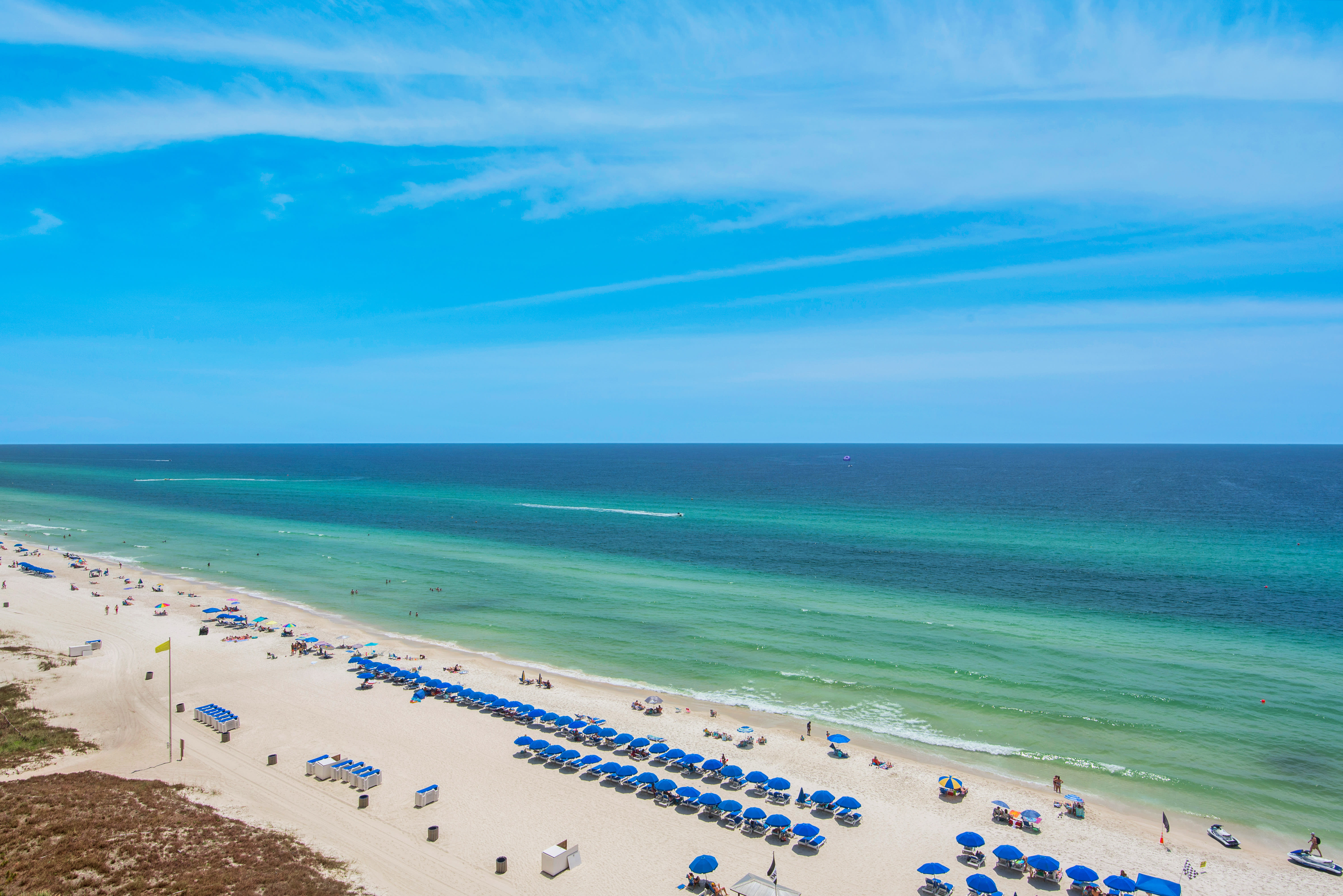 Two reserved beach chairs with umbrella included in rental.