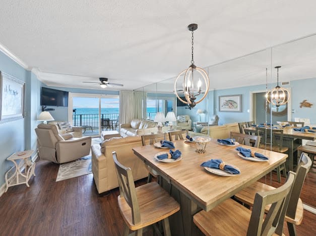 Bar Top table with 6 chairs in the dining area.