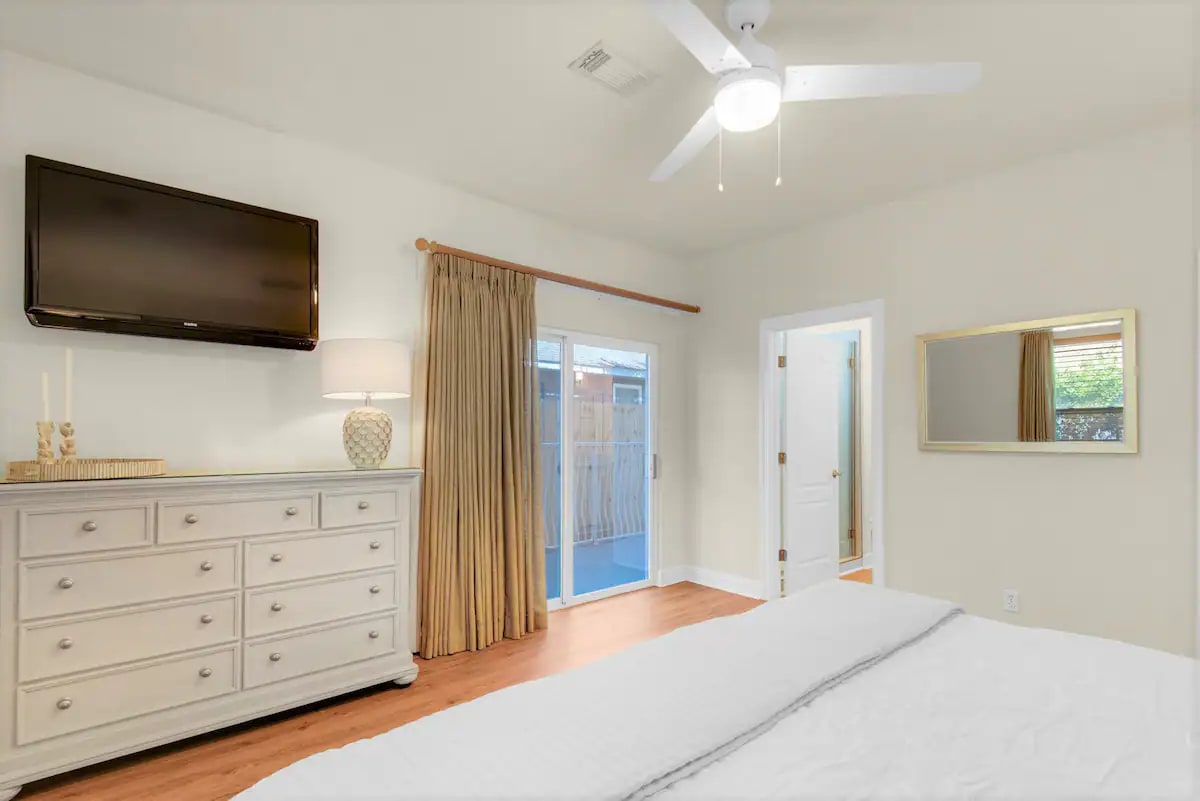 Shipwatch-15...1st floor. Bedroom 1, photo 3. King suite with private full bath, private pool entrance and wall mount TV.