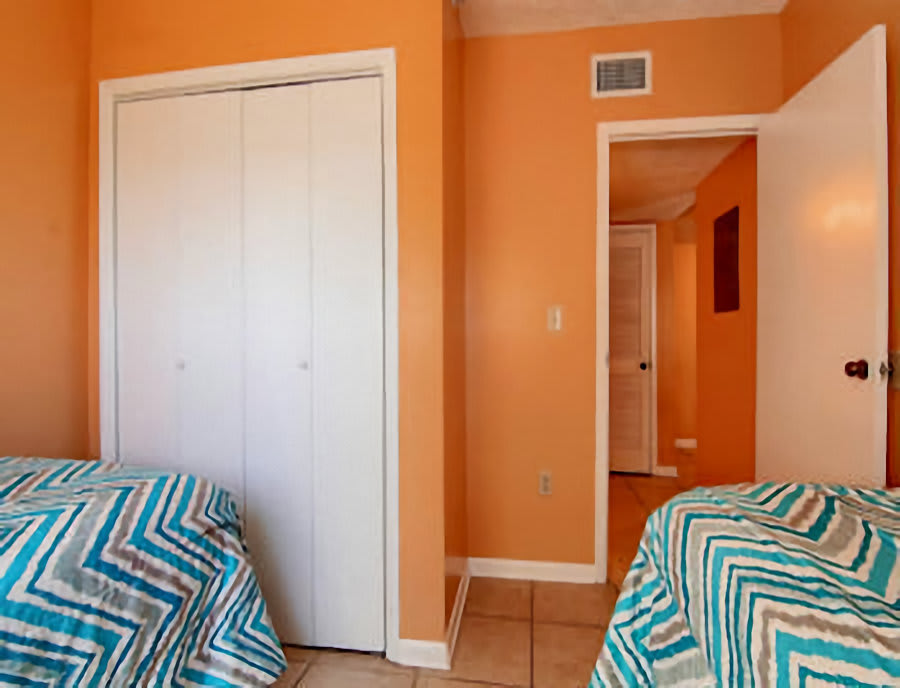Guest Bedroom, Closet with View to Kitchen