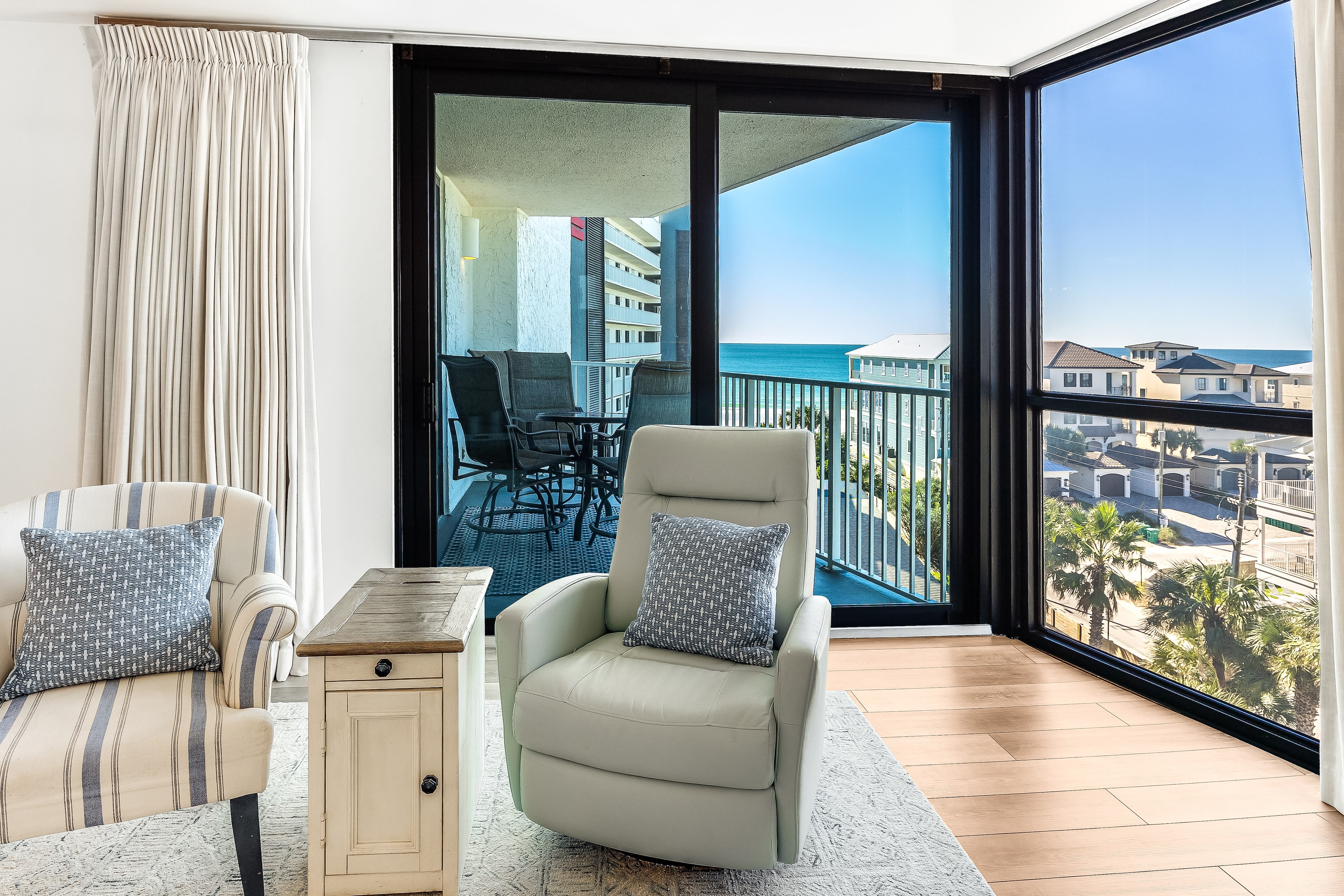 corner windows lead to a private Gulf view balcony!