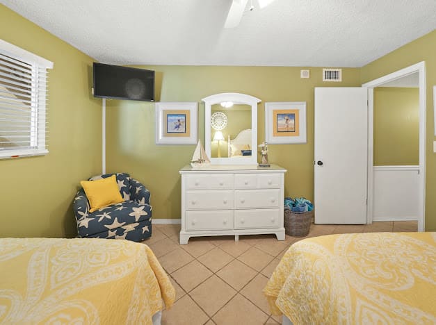 Back bedroom has two full beds along with 32 inch TV