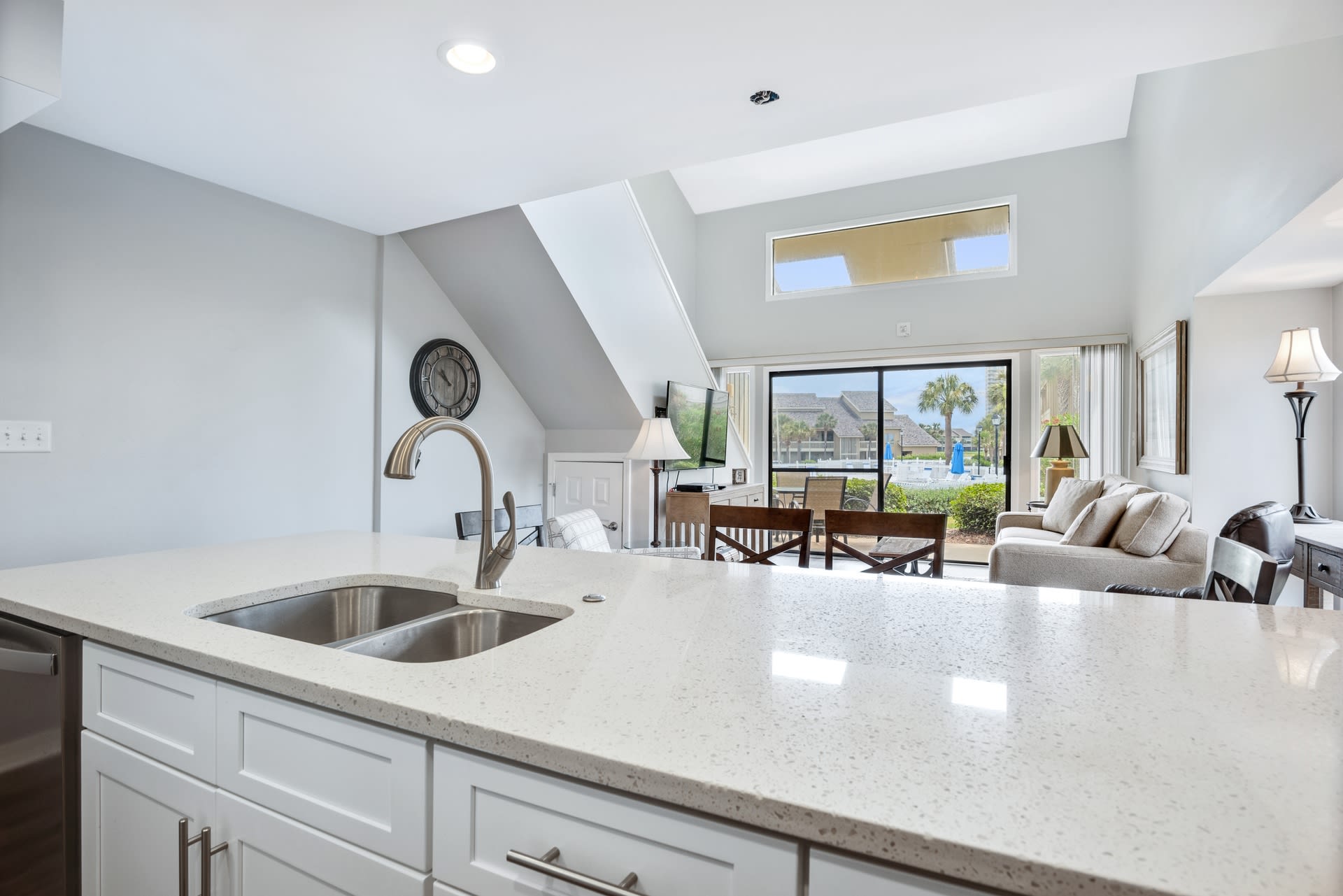 Open floor plan with view of pool from kitchen