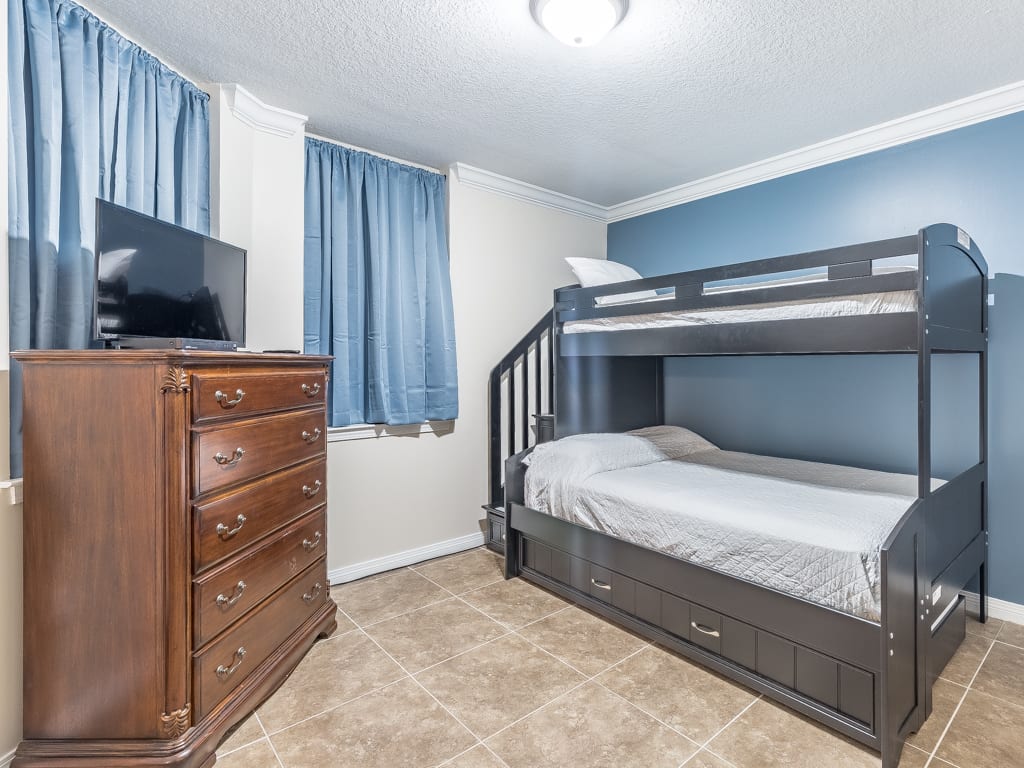 The first bedroom sleeps four. There is a bunk bed plus trundle on the bottom.