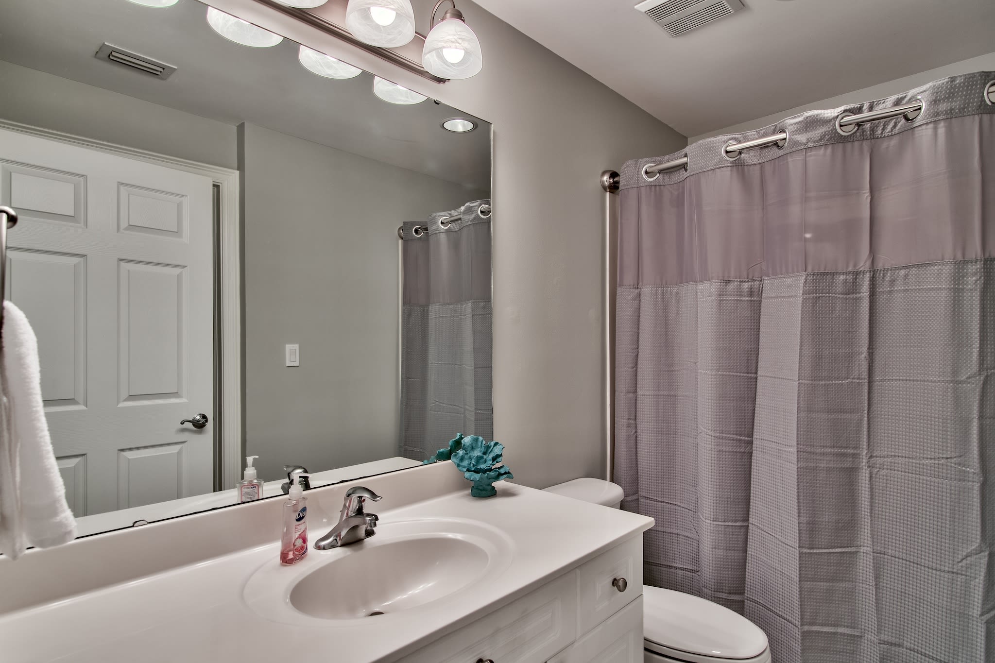 The 2nd bath is accessible from the hall and the 2nd master bedroom. 