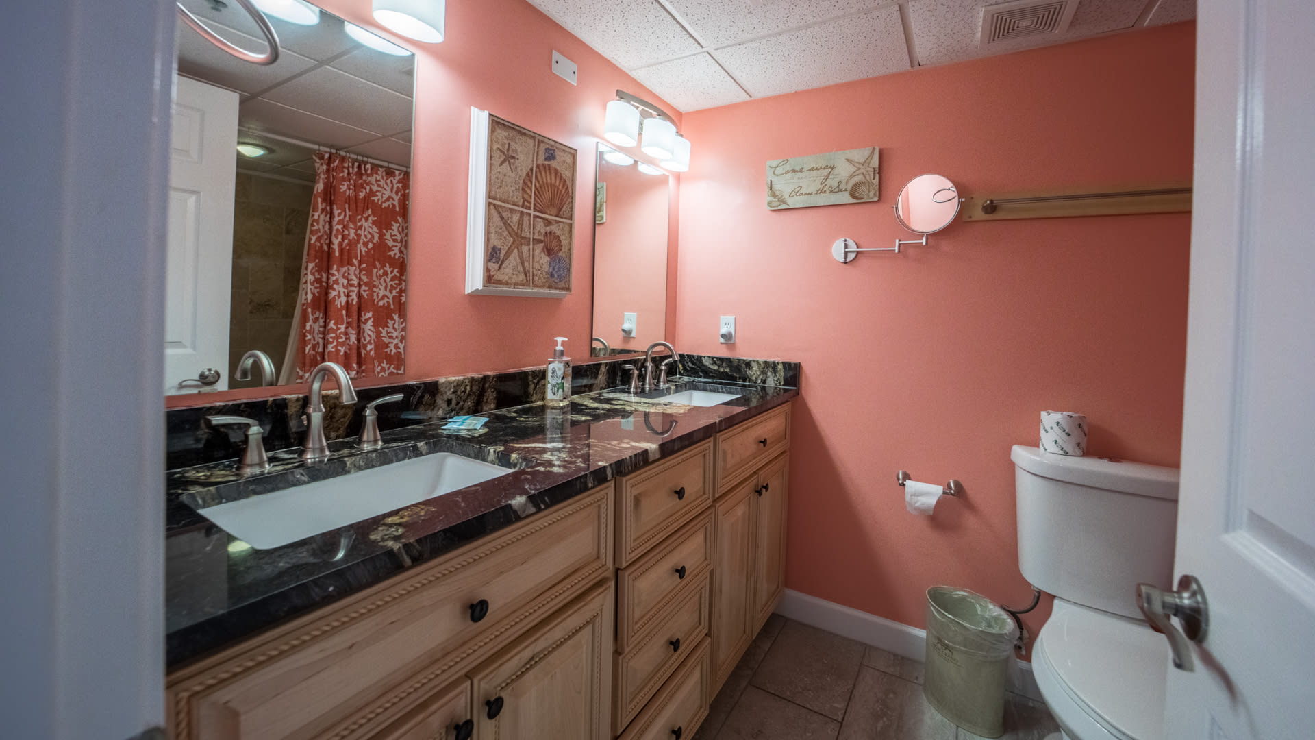 Double vanity w/new cabinets and granite counter tops.  Bath tub/shower