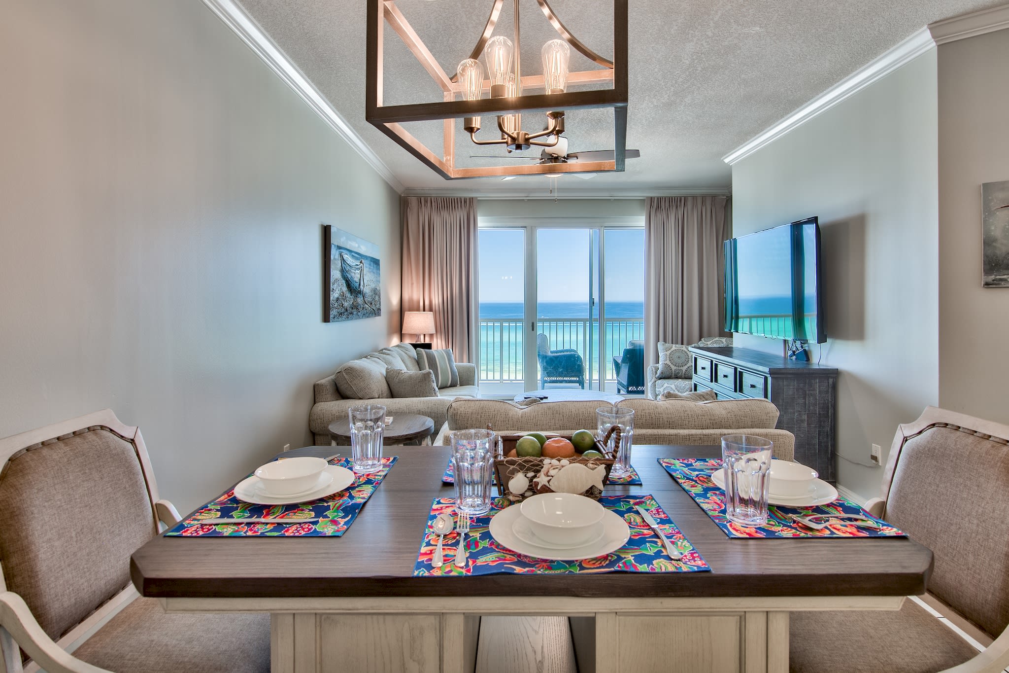 The dining table seats 6 with 3 seats at the bar. 