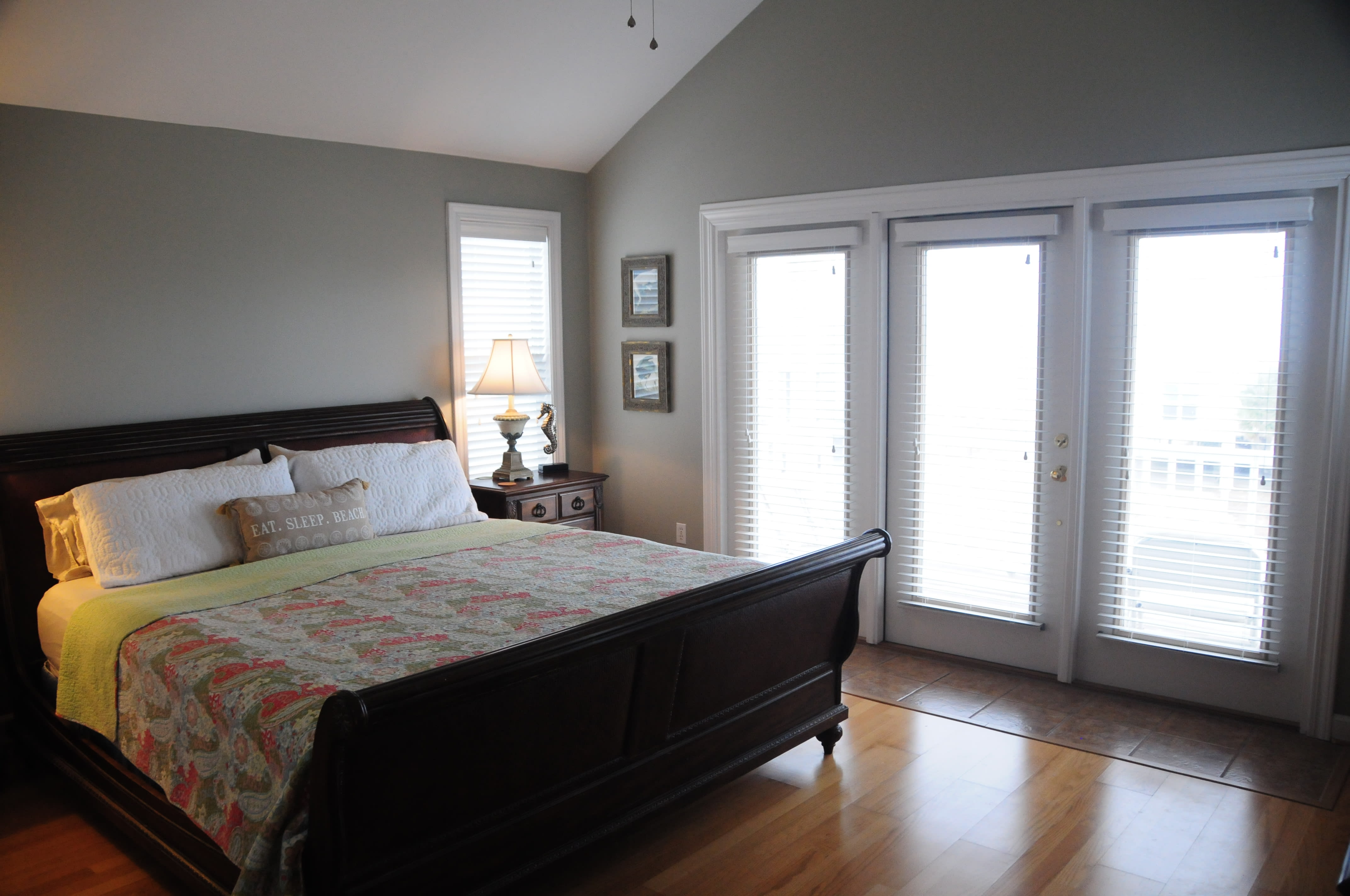 The king bed in the upstairs master bedroom