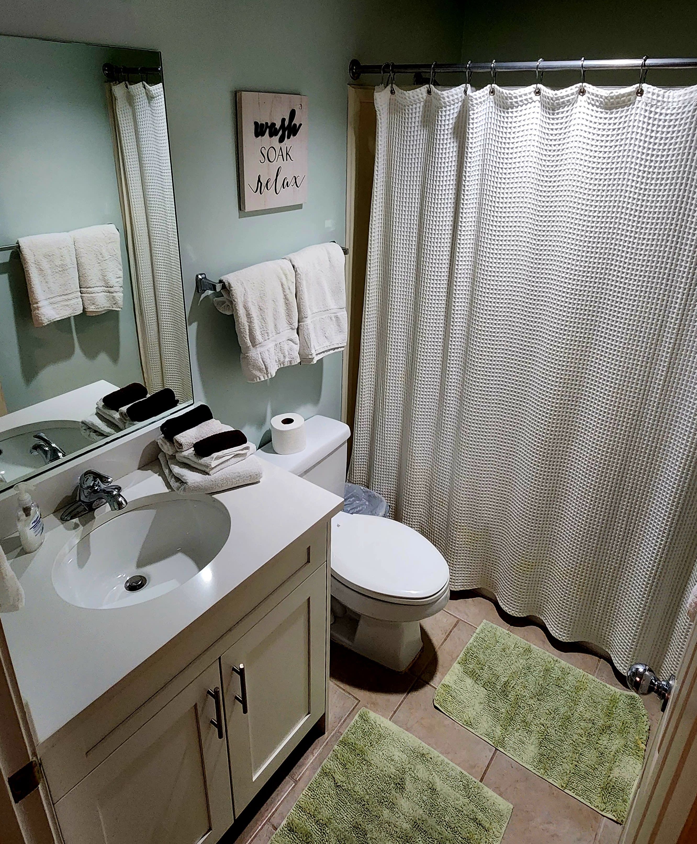 Full bath attached to guest bedroom.