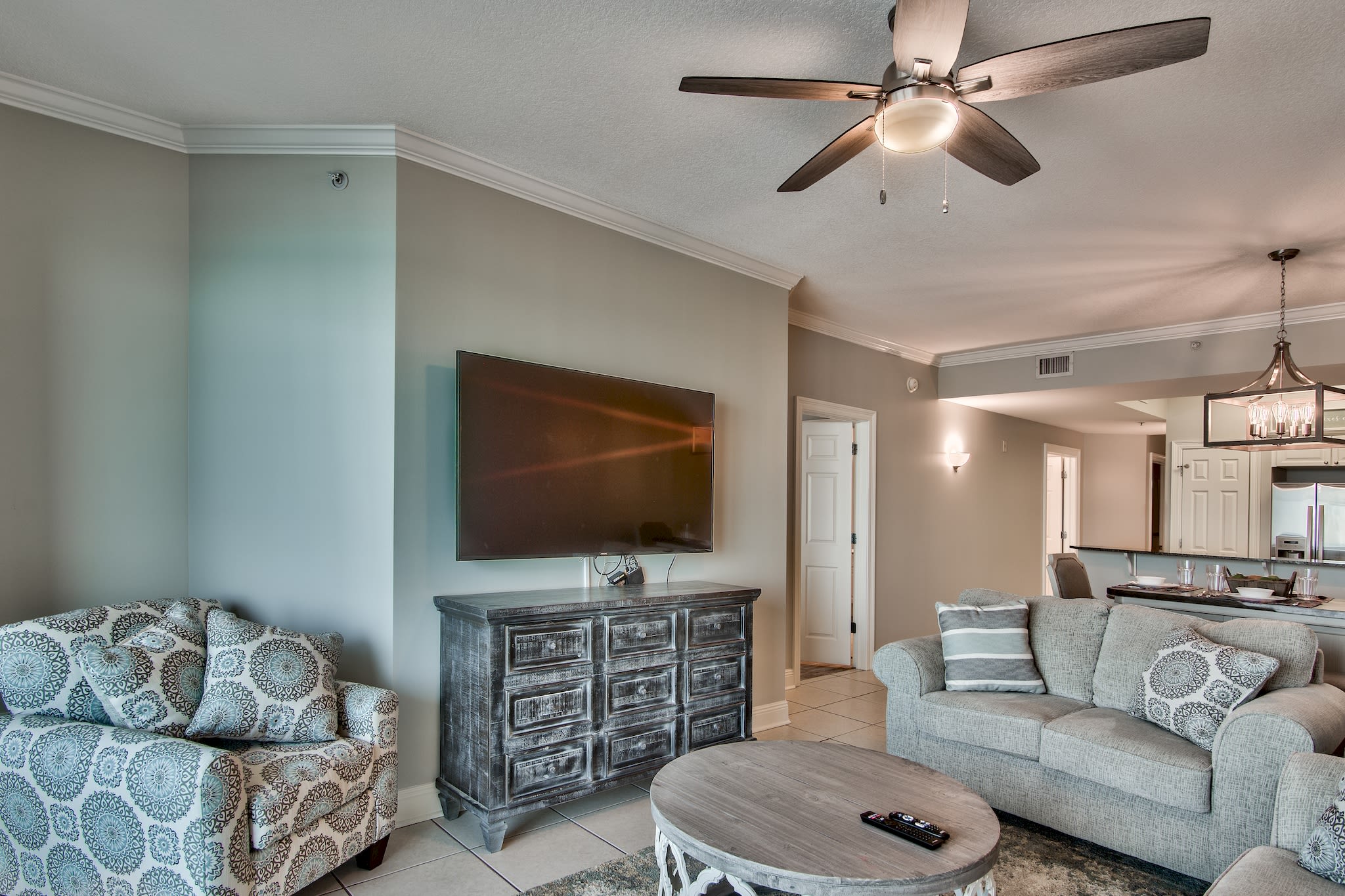 Gather the family for movie nights with comfortable seating and our 65" Smart TV! 