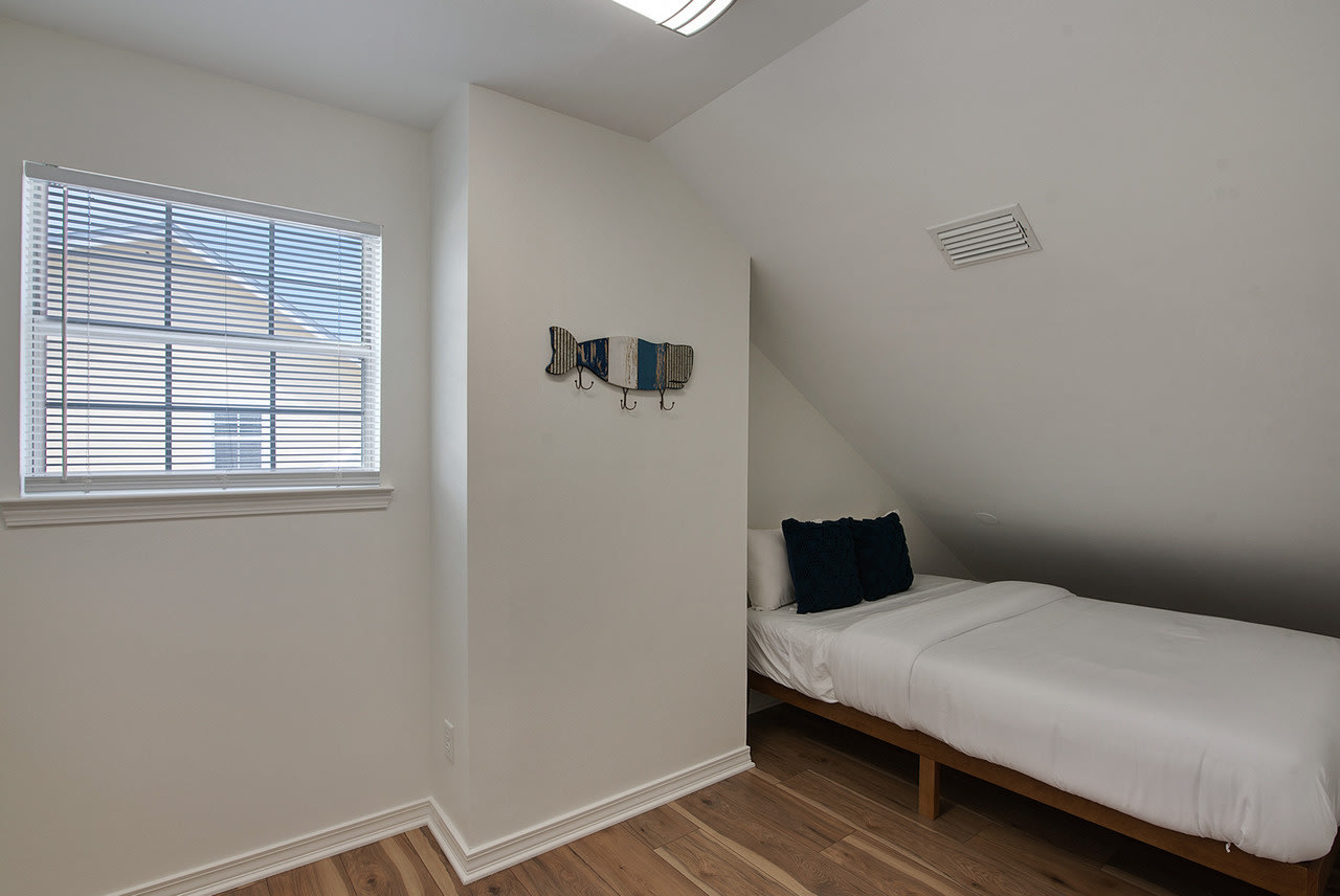 Upper level Queen bed (Yes, it is a queen bed!)