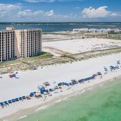 Beach with white sand emerald waters.2 chairs &amp;umbrella included with rental.