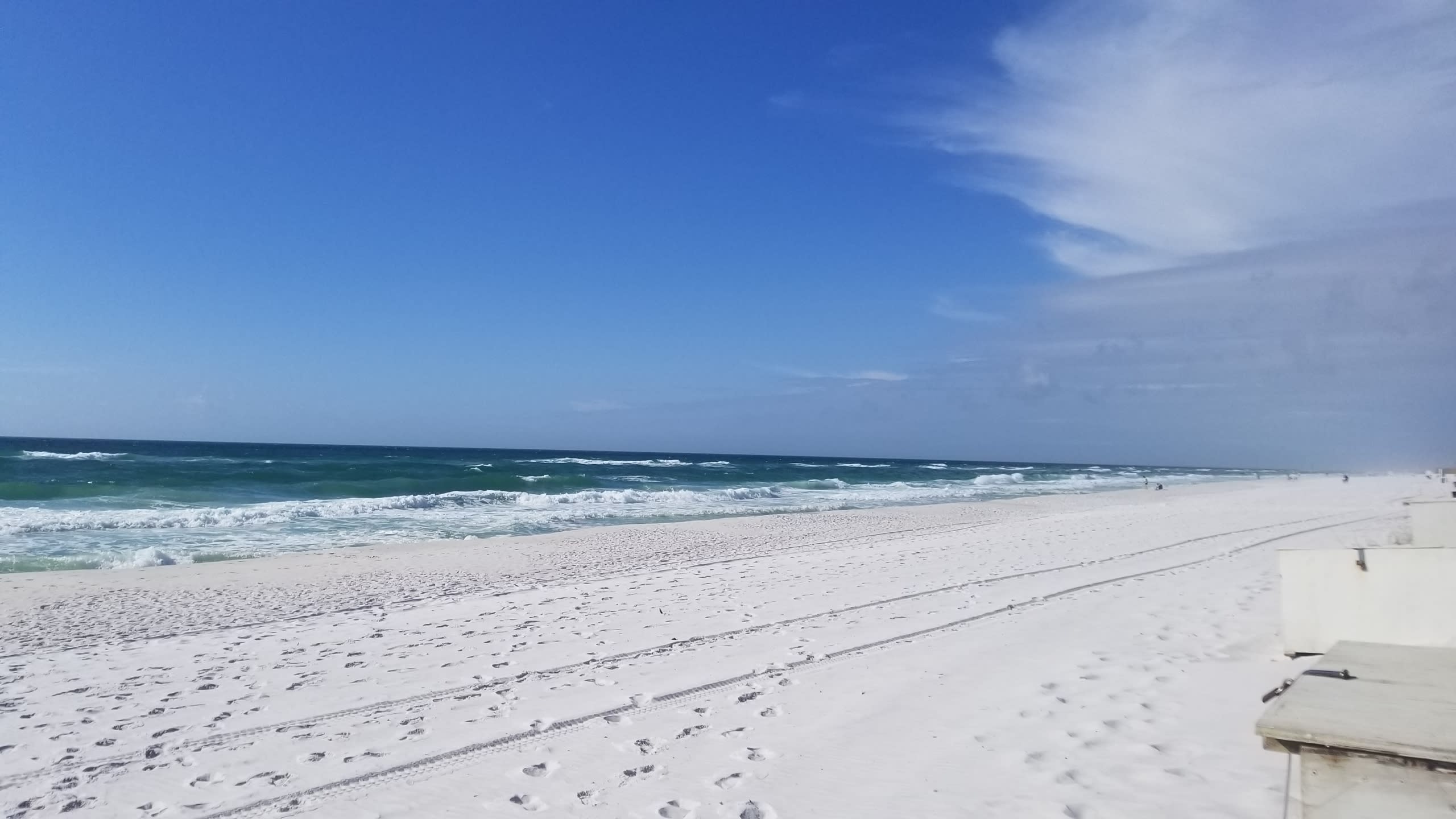 Sugar white sand beach steps from the beachfront condo. 