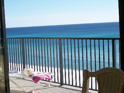 STUNNING VIEWS FROM MAIN LIVING ROOM BALCONY WITH  LOUNGES AND CHAIRS TO RELAX