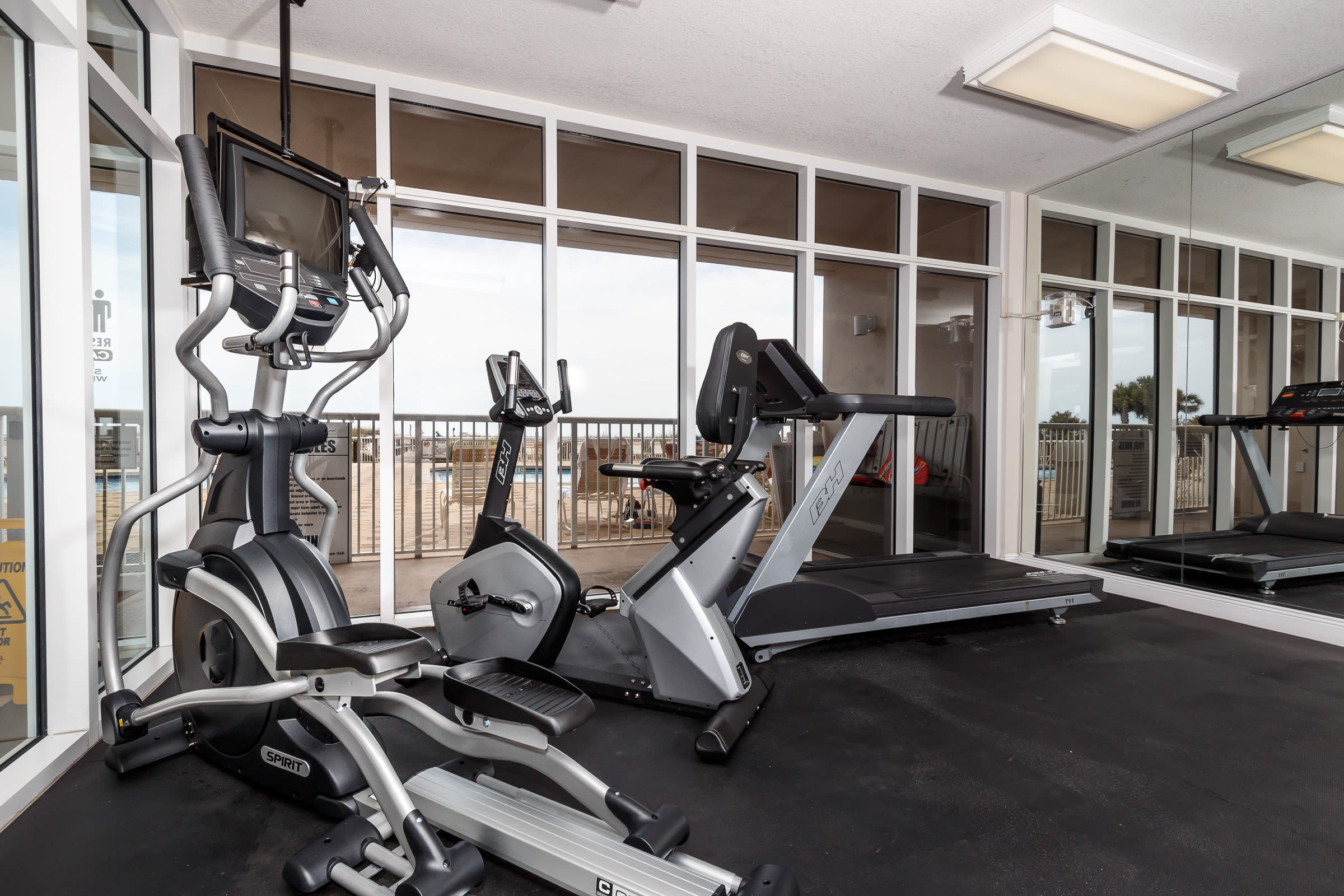 The fitness room is poolside and gulf front! 