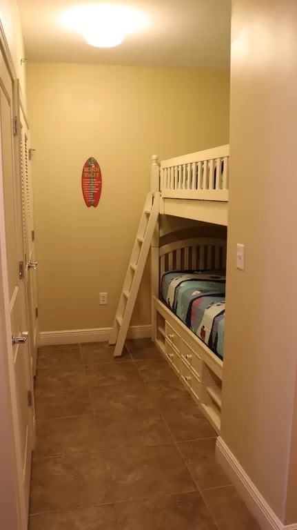 Bunk Beds and laundry area across from hall bathroom