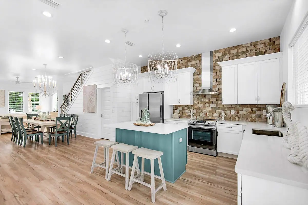 Windsong-13 features a beautiful quartz island seating for grab-and-go meals so that your family can make quick work of getting to the beach!