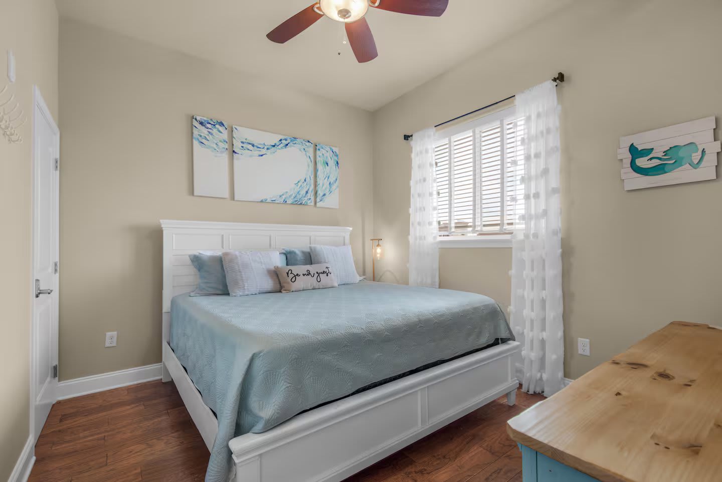 King Bedroom #2 with dresser and smart TV