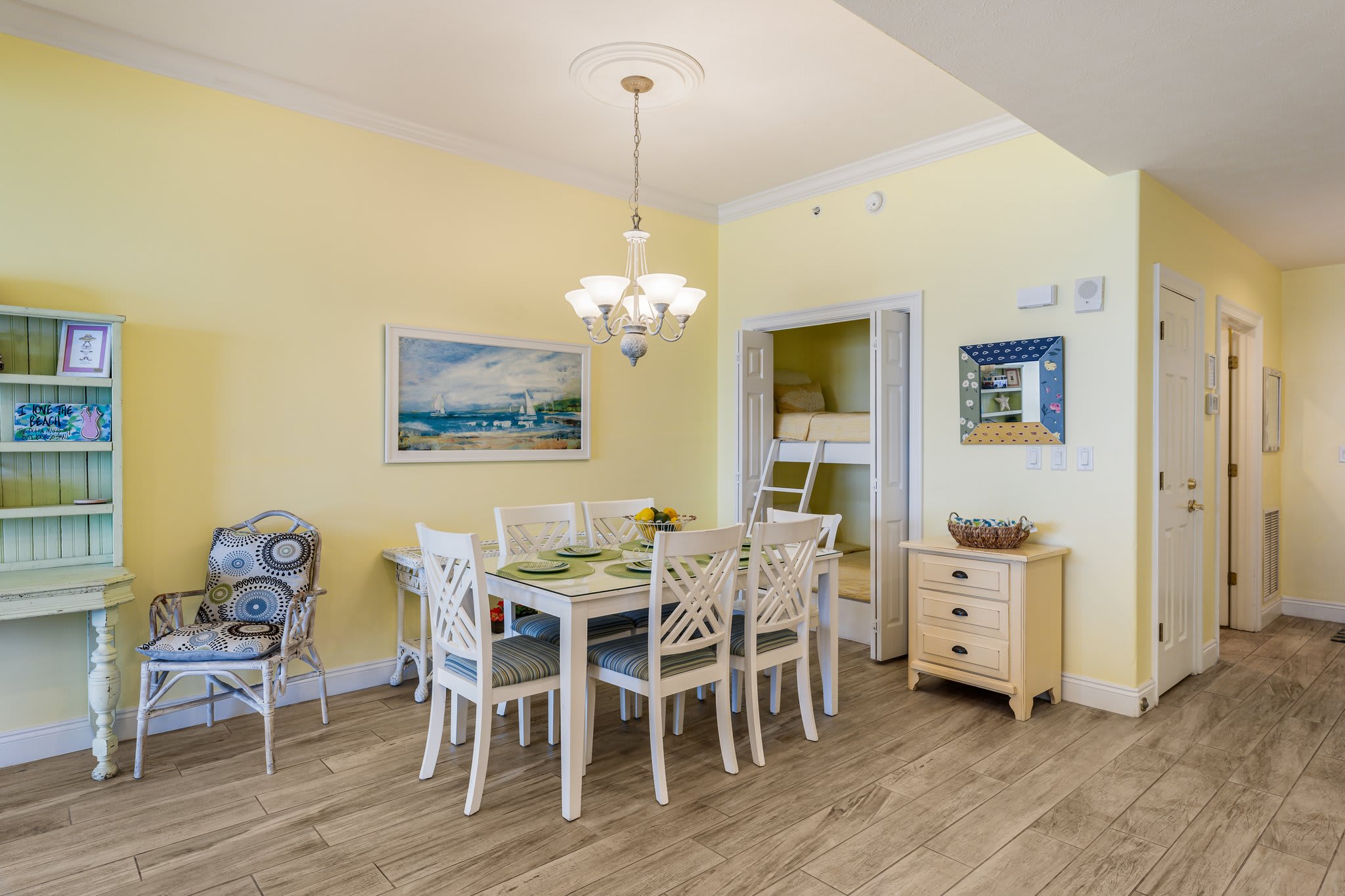 Large dining table and stacked bunk for additional guests.