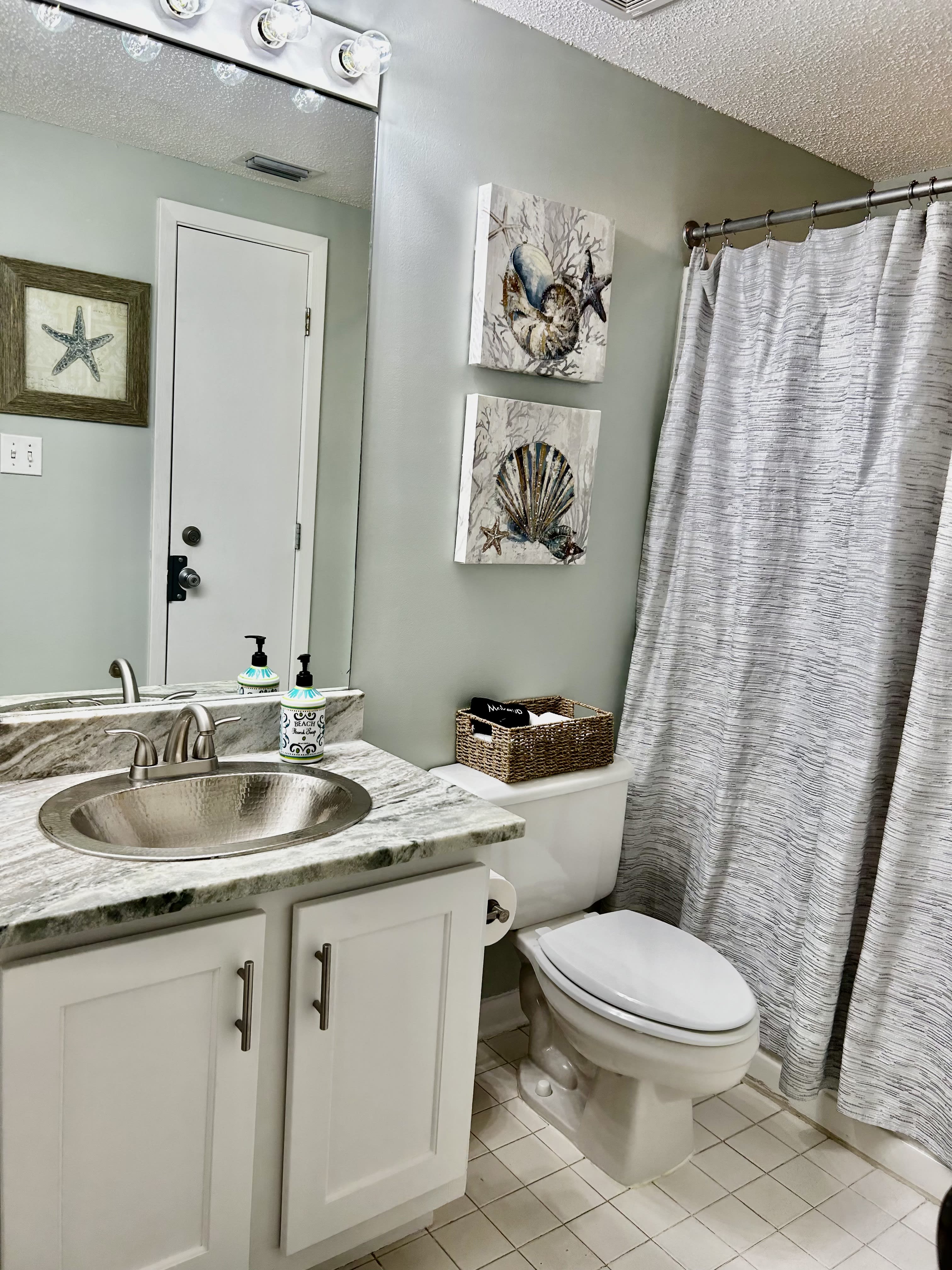 Bathroom 2 newly remodeled cabinets and granite countertops