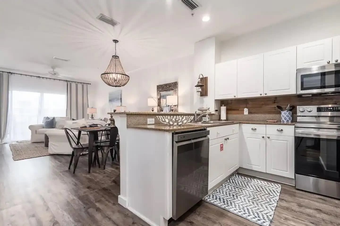 Open concept kitchen, dining area, and living room