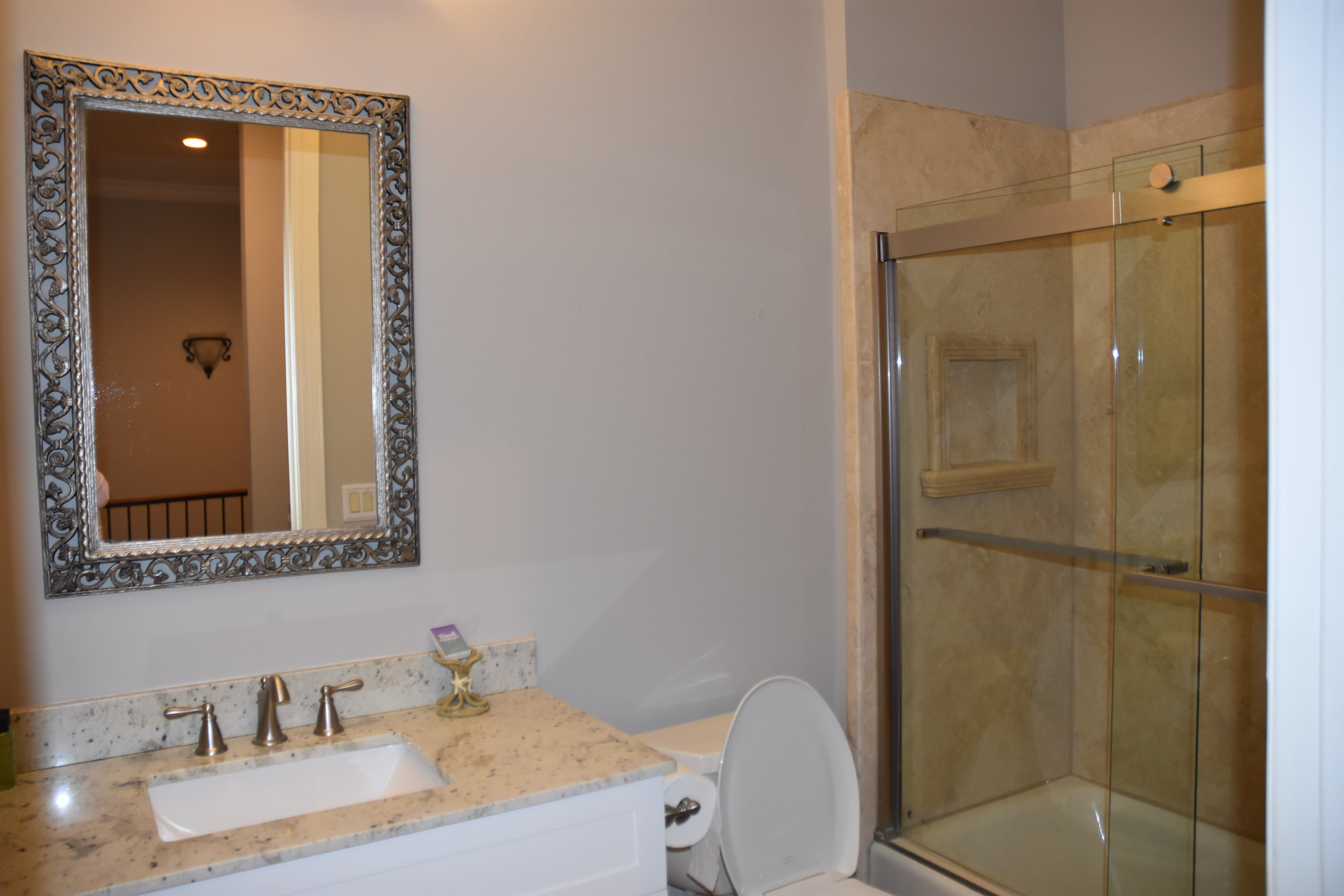 Shared bath for the queen and bunk rooms