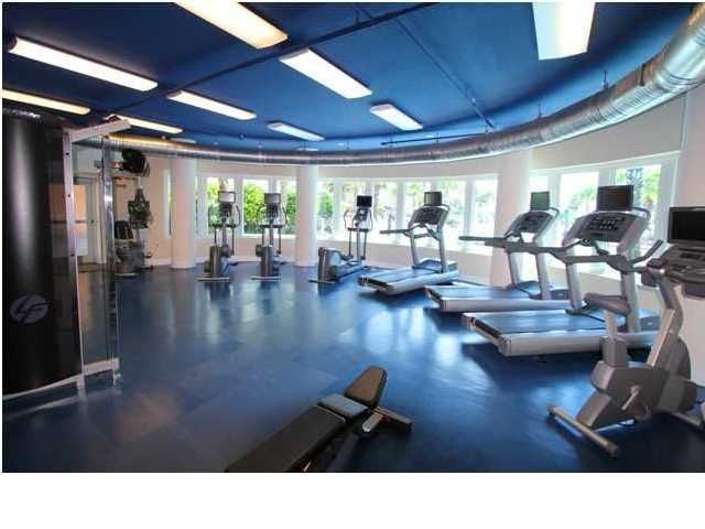 state of the art fitness room overlooking the pool.