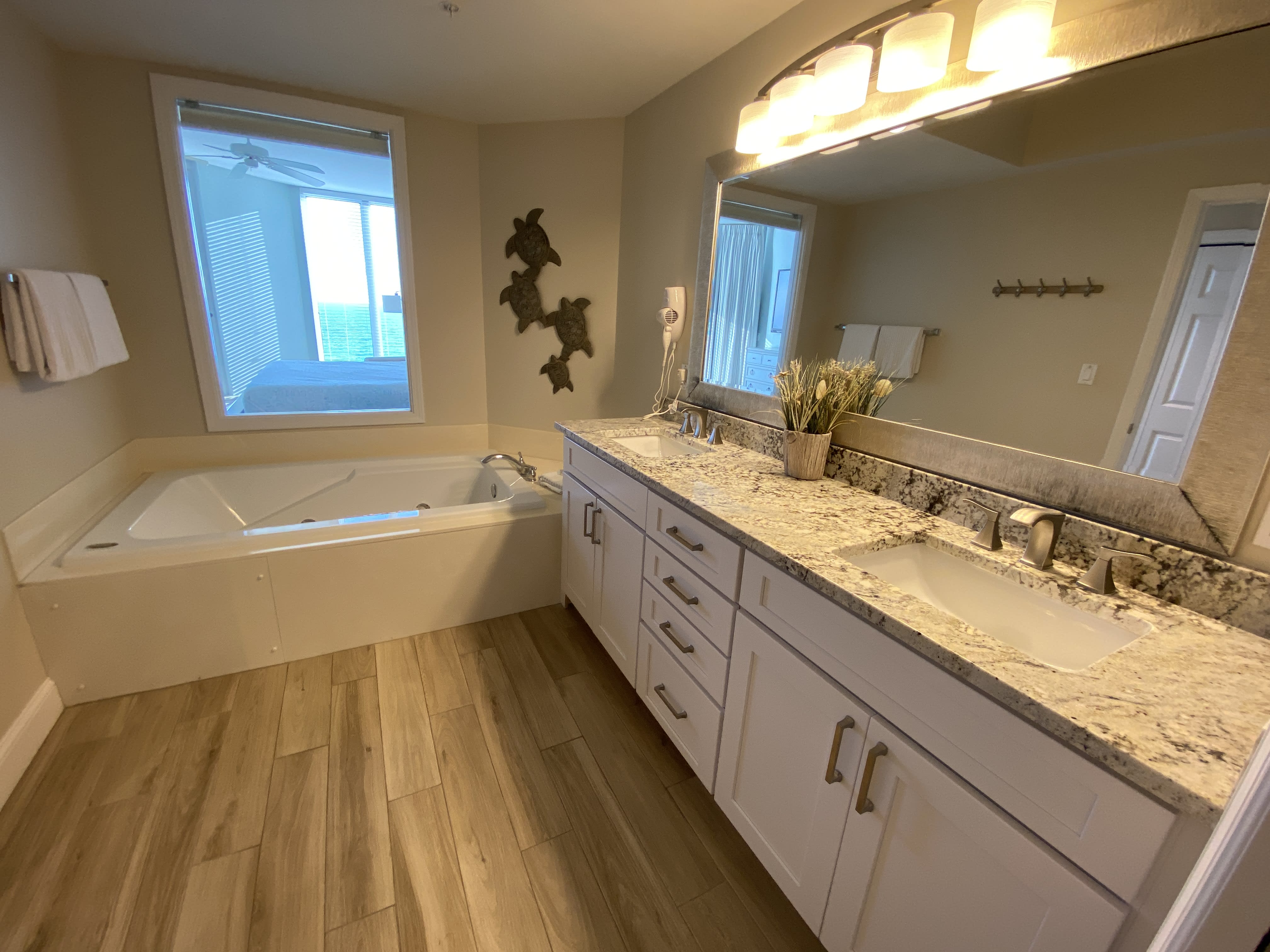 Bdrm 1- Large master suite, pass through gulf window with full privacy shade.