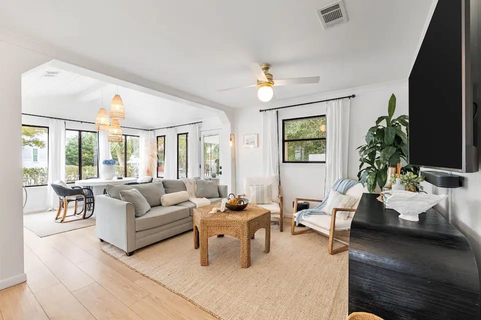 Living Room open to the dining and kitchen. Sonos speaker &amp; large tv